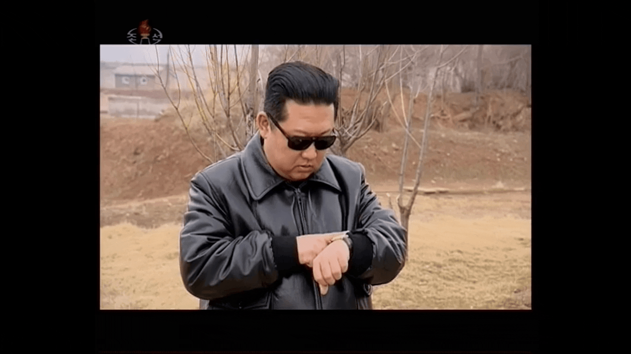 An incredibly awkward segment from North Korea's latest propaganda video showing off the Hwasong-17 nuclear-capable missile and dictator Kim Jong Un. (Gif: KCTV / KCNA Alert / Gizmodo)