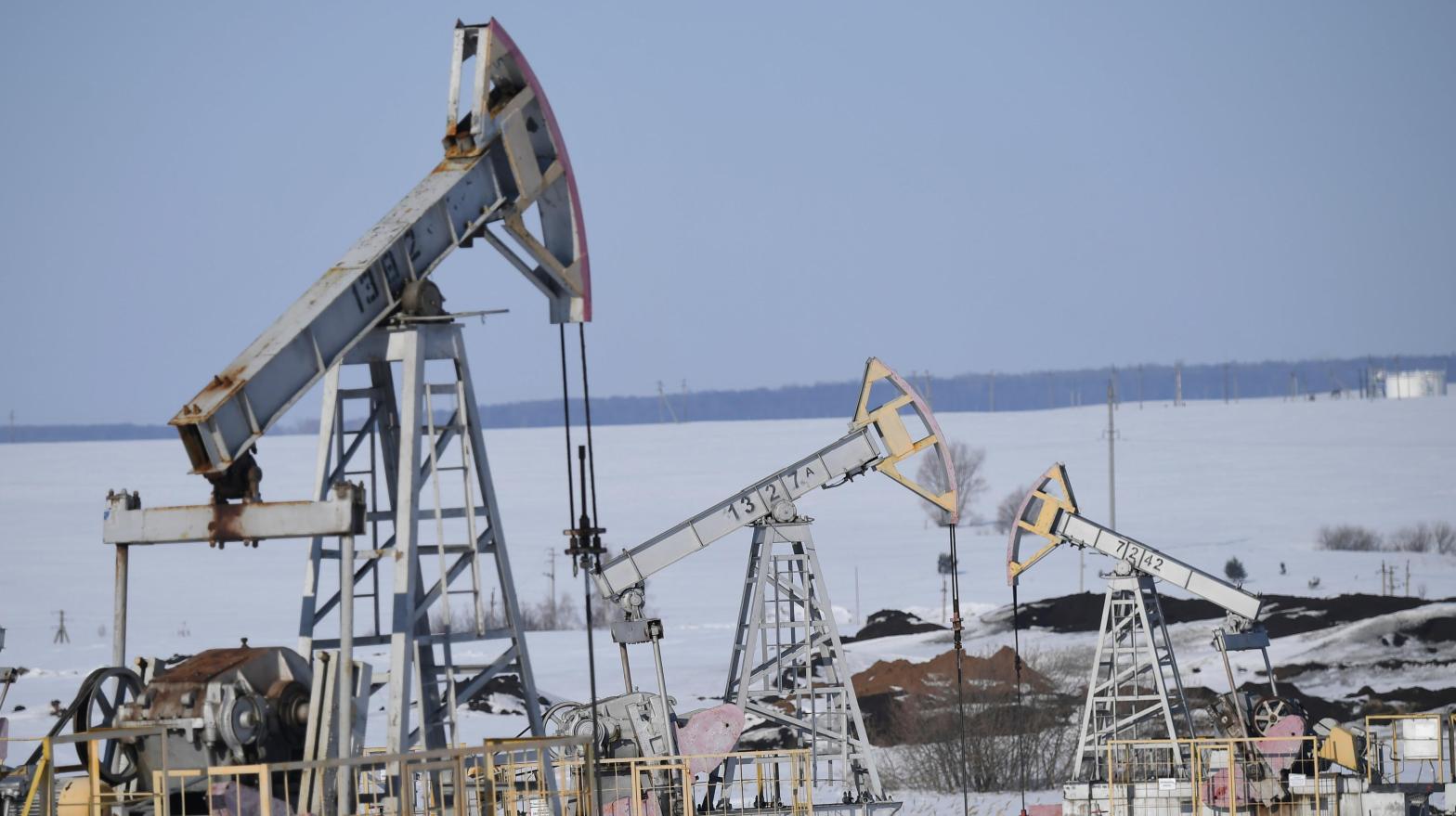 An oil pumpjack is seen in Almetyevsk District, Tatarstan, Russia. (Photo: Maksim Bogodvid / Sputnik, AP)