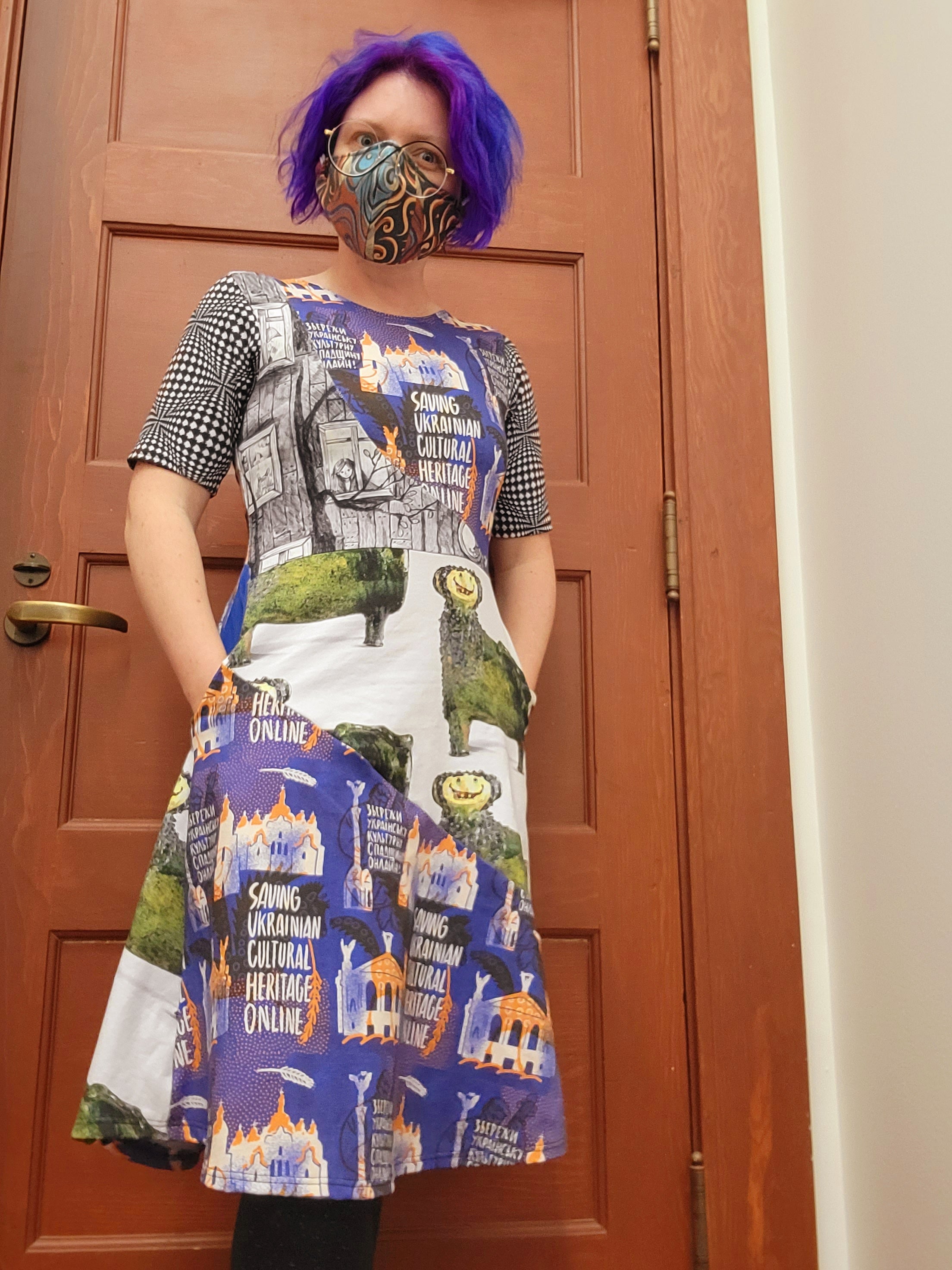 Quinn Dombrowski in a dress inspired by SUCHO they made. It features artwork commissioned for the project and a two-faced lion sculpture from the National Folk Decorative Art Museum. (Photo: Courtesy of Quinn Dombrowski)