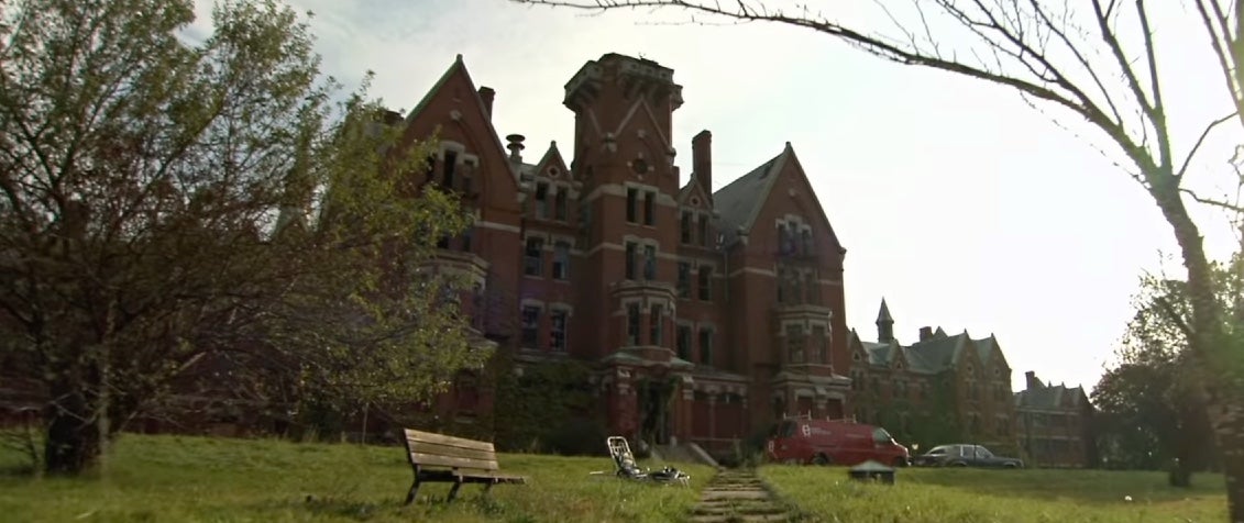 Not very welcoming, though oddly enough what's left of the hospital today is now... luxury apartments. (Screenshot: USA Films)