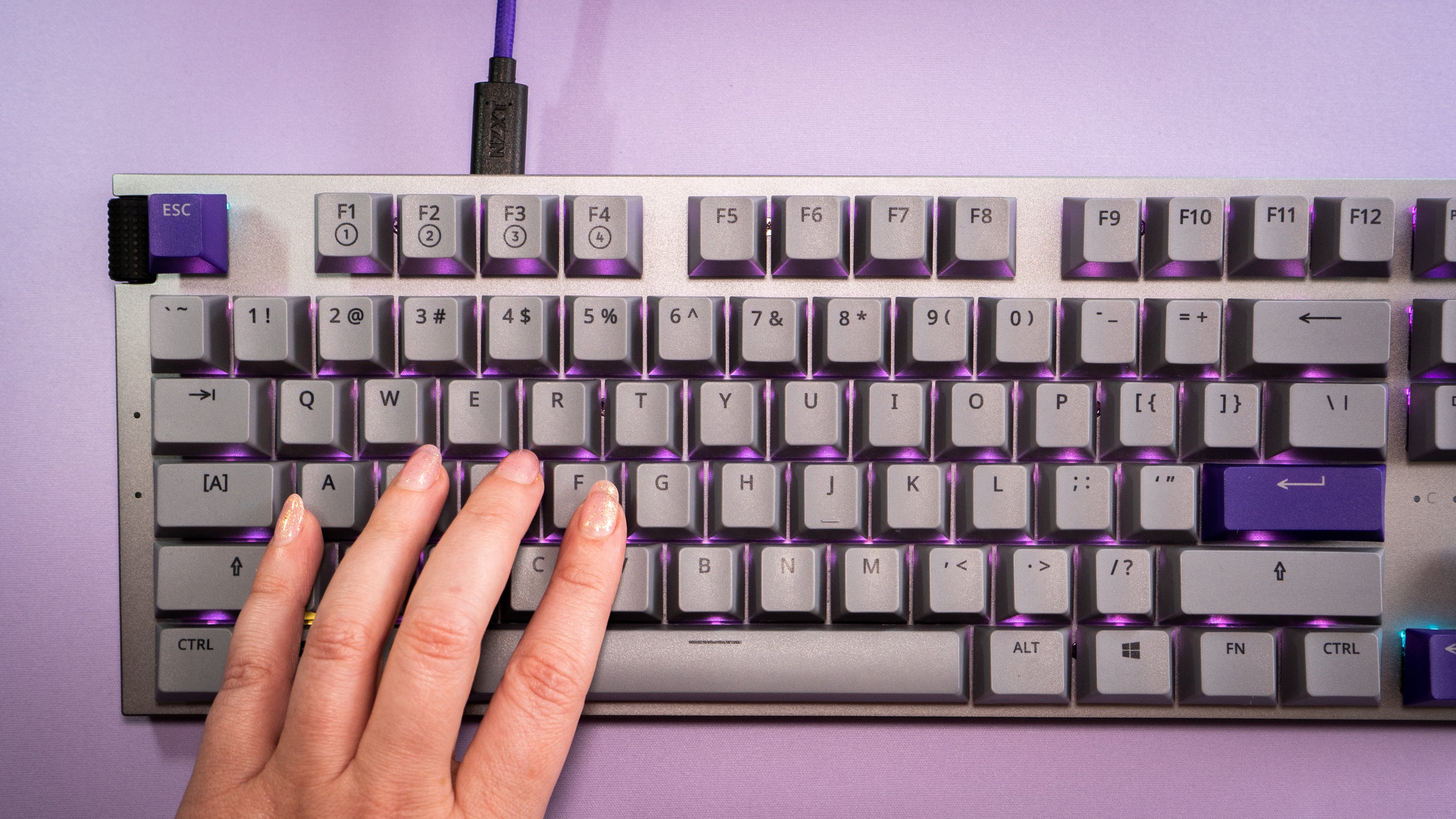 If you don't mind the computer-y look of this keyboard, you can't go wrong with the NZXT Function in your switch of choice.  (Photo: Florence Ion / Gizmodo)