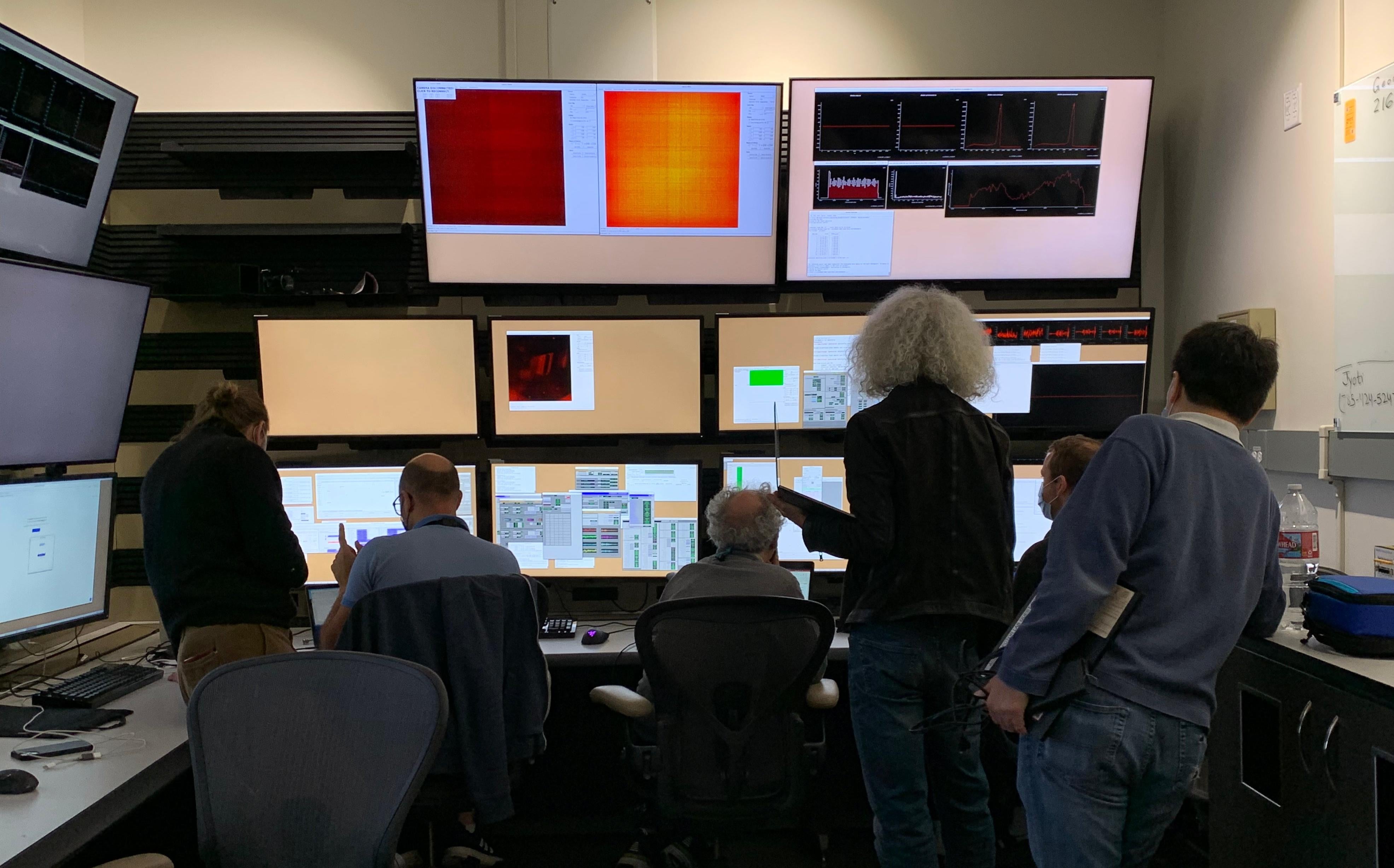 Researchers checkout results from the chemRIXS instrument tests. (Photo: Isaac Schultz)