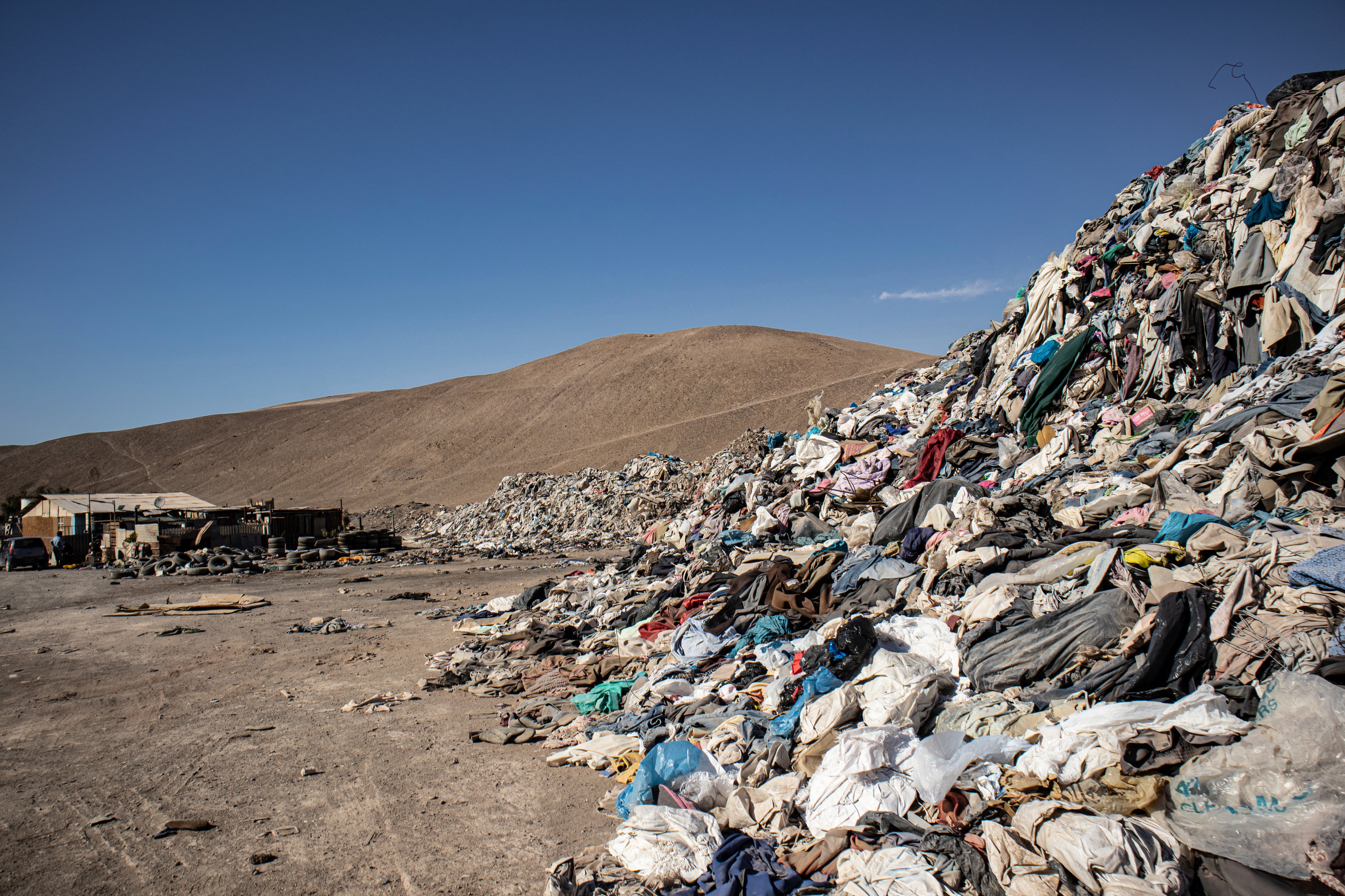 Clothes form a new dune in the desert outside of Iquique. (Photo: Antonio Cossio, AP)