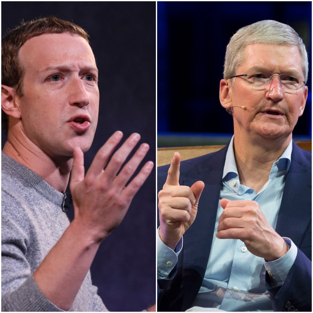 A metaverse-esque virtual simulation of what it might be like if Mark Zuckerberg (left) and Tim Cook (right) were actually to fight.  (Photo: Drew Angerer / Michel Porro, Getty Images)
