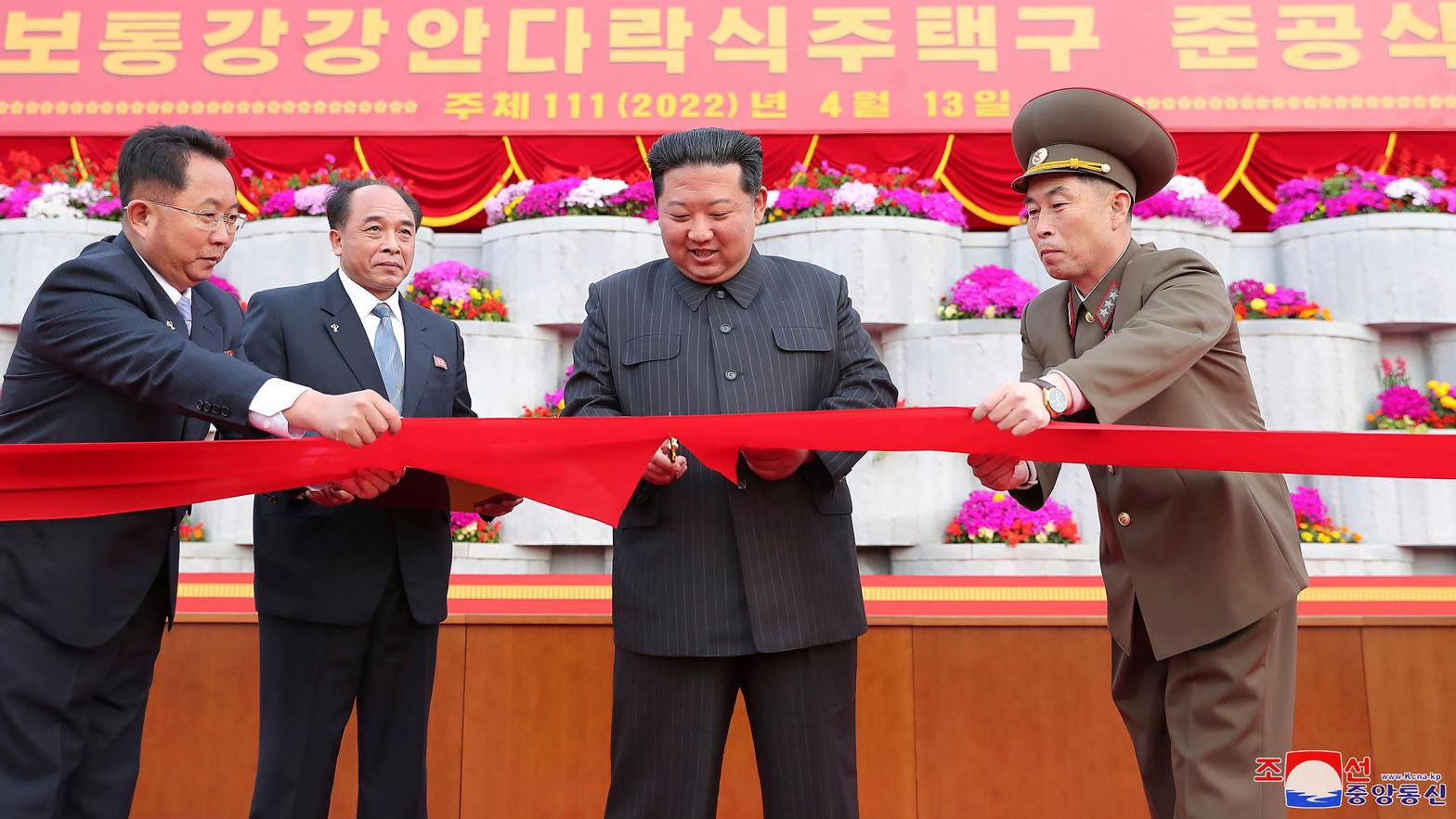Kim Jong Un, second right, cuts the ribbon during an inauguration ceremony of Pothong riverside terraced residential district in Pyongyang, North Korea on April 13, 2022. (Photo: Korean Central News Agency/Korea News Service, AP)