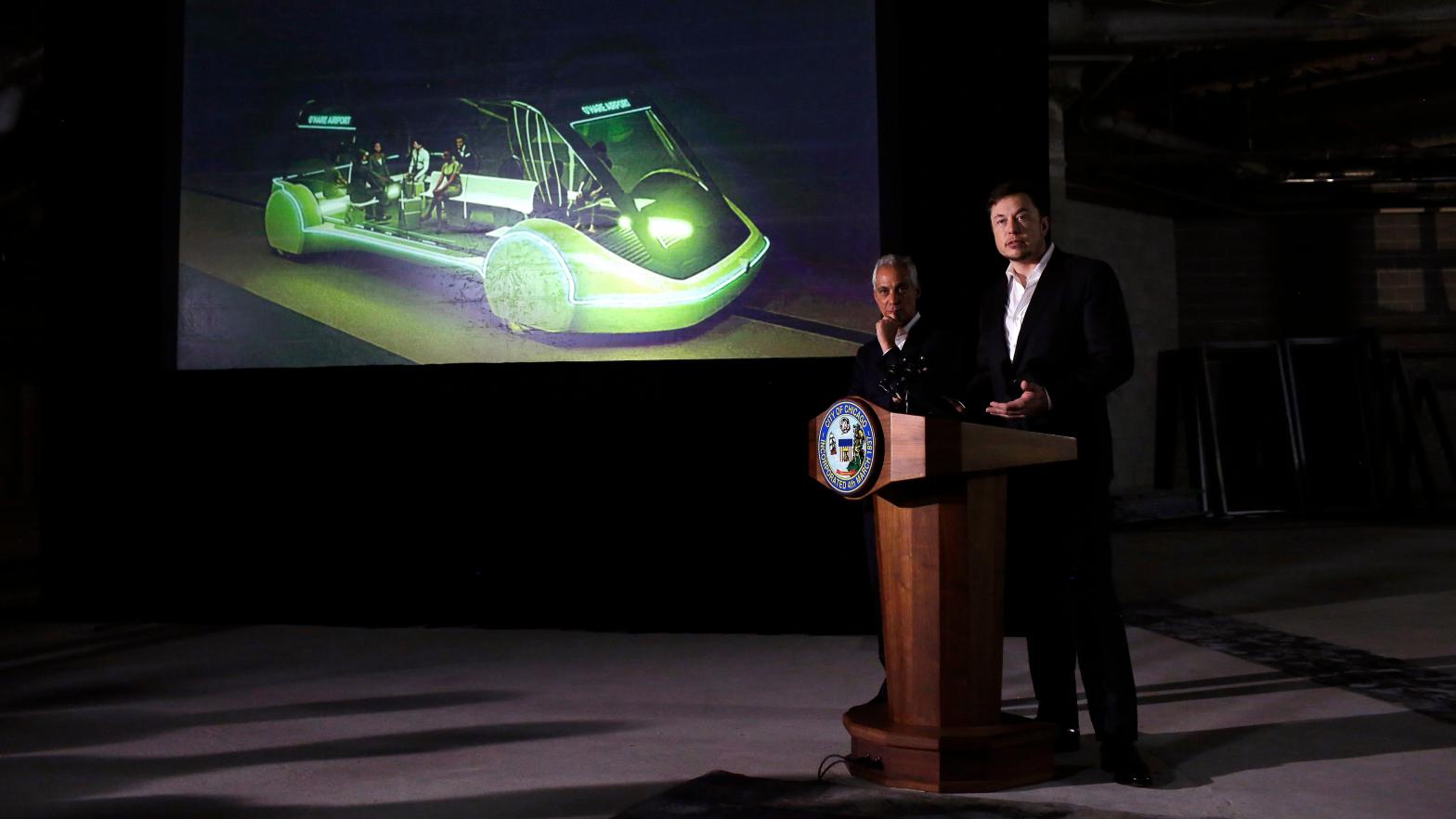 Chicago Mayor Rahm Emanuel and Elon Musk in Chicago announcing a new 16-passenger transportation system in Chicago on June 14, 2018. It never happened. (Photo: Joshua Lott, Getty Images)