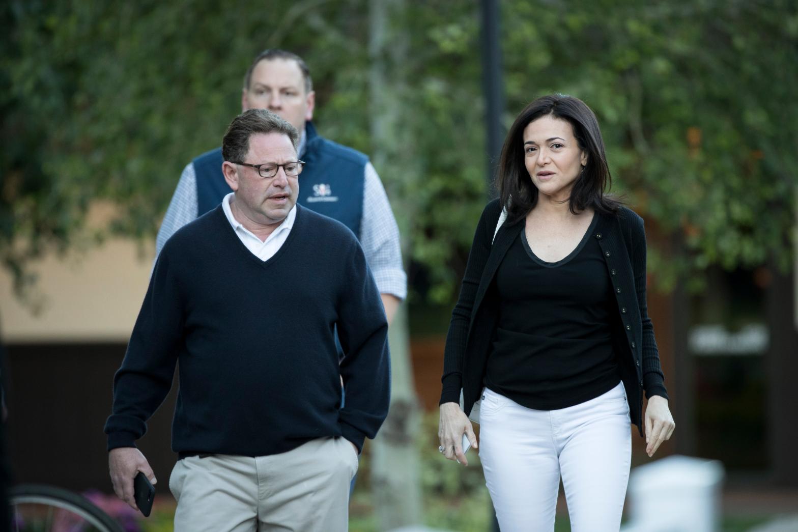 Bobby Kotick, chief executive officer of Activision Blizzard, and Sheryl Sandberg, chief operating officer of Facebook, together for a conference in 2018, before the couple split. (Photo: Drew Angerer, Getty Images)