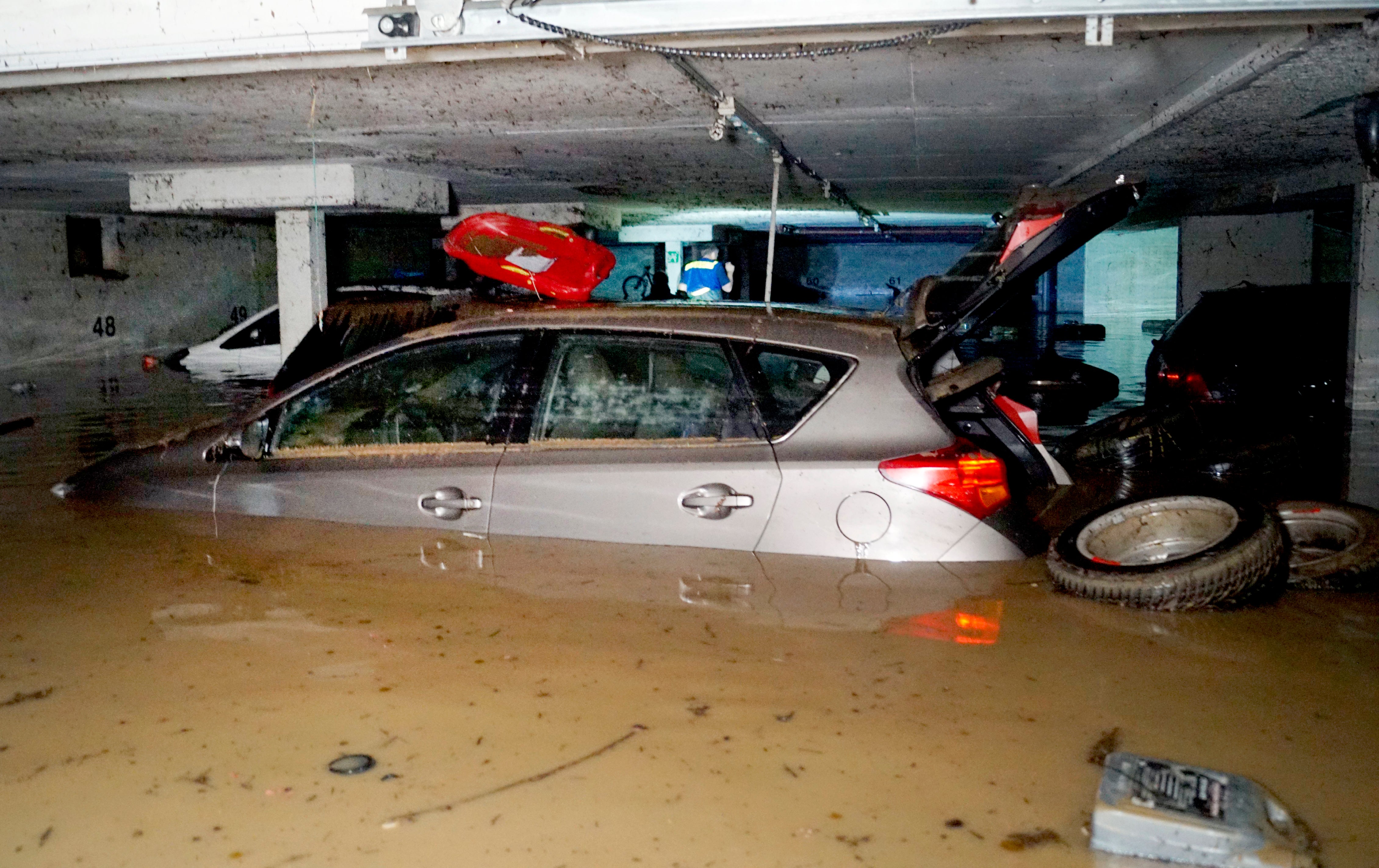 Vehicles are parked in a flooded underground car park on June 12, 2018 in Hochdorf, Germany.  (Photo: Alexander W’lfl, AP)