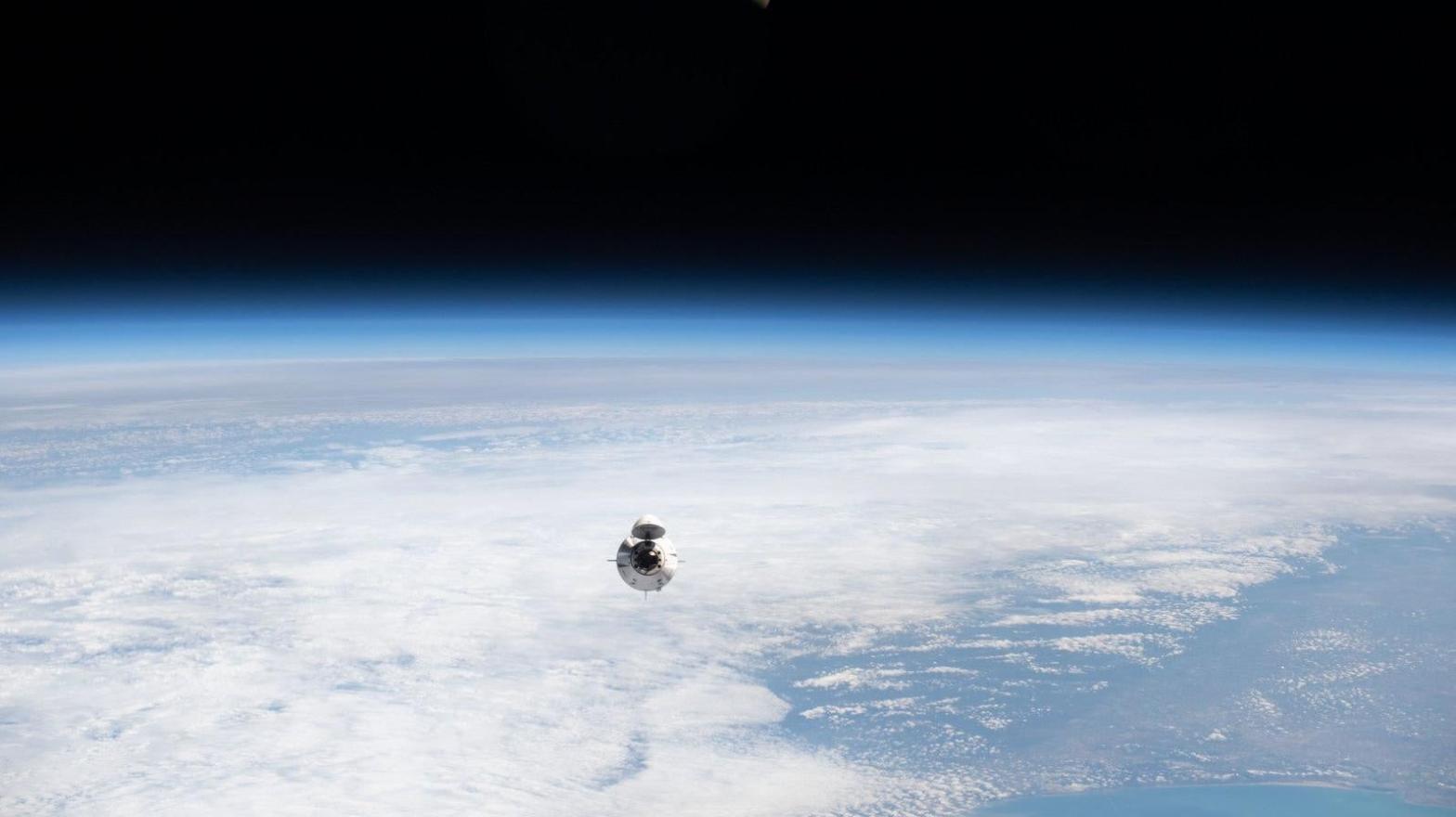 The SpaceX Dragon Endeavour carried the astronauts to and from the low-orbit space station. (Image: NASA)