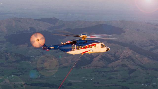 Watch as a Helicopter Catches a Falling Rocket Booster (Then Drops It in the Ocean)