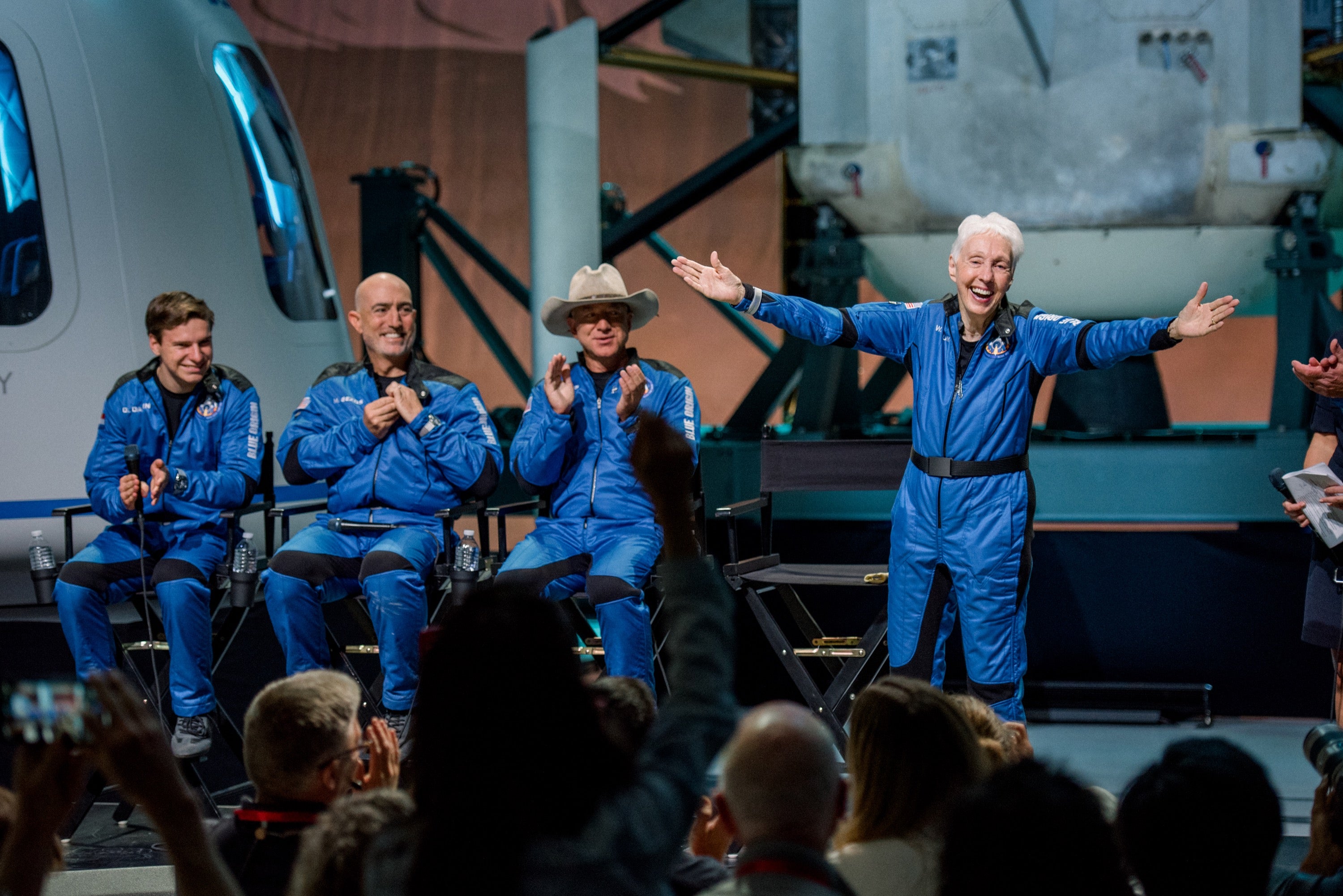 Wally Funk, with arms outstretched, and other members of the Blue Origin NS-17 crew, July 2021.  (Photo: Blue Origin)