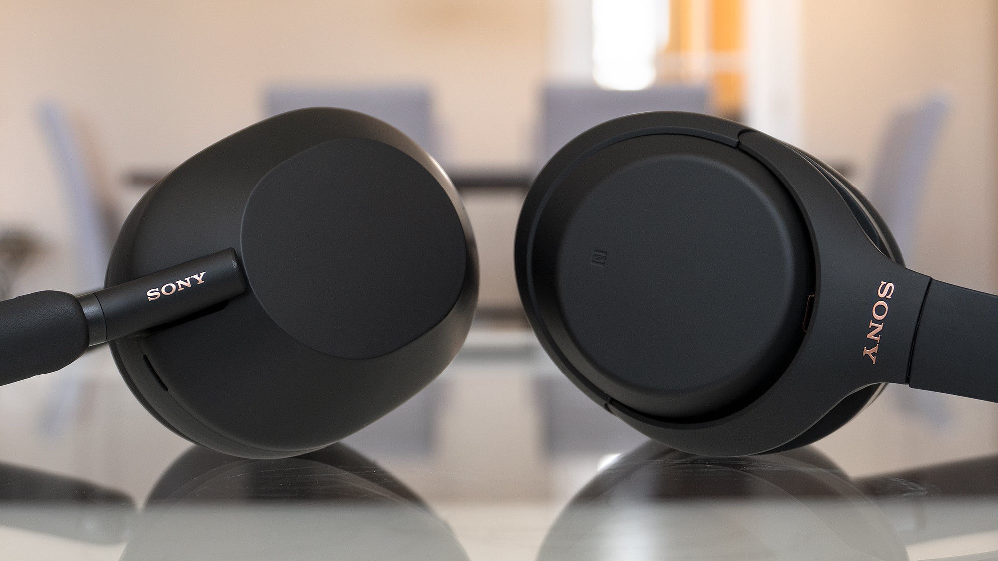 There's not a lot of reasons for fans of the Sony WH-1000XM4 (right) to upgrade to the new WH-1000XM5 (left), but as an overall package I do recommend them as a cheaper alternative to Apple's pricy AirPods Max. (Photo: Andrew Liszewski - Gizmodo)