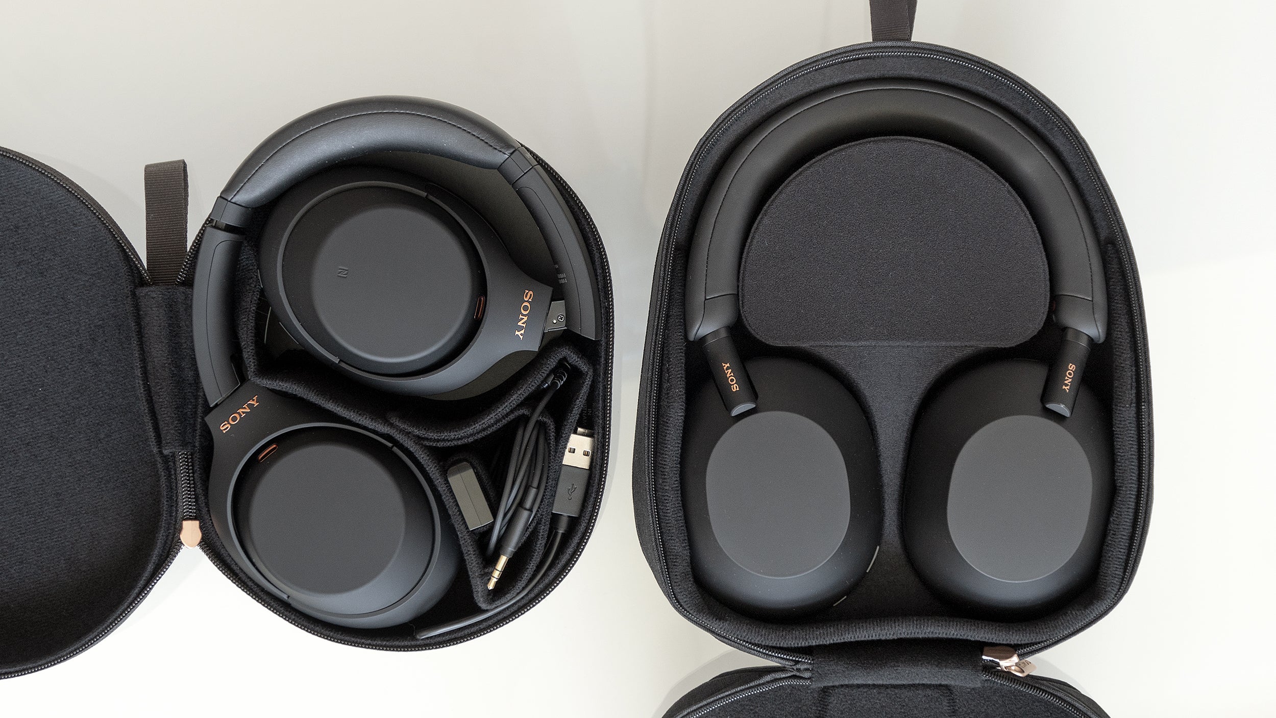 As a result, the carrying case for the Sony WH-1000XM5 (right) is a bit larger than the case included with the WH-1000XM4 (left). (Photo: Andrew Liszewski - Gizmodo)