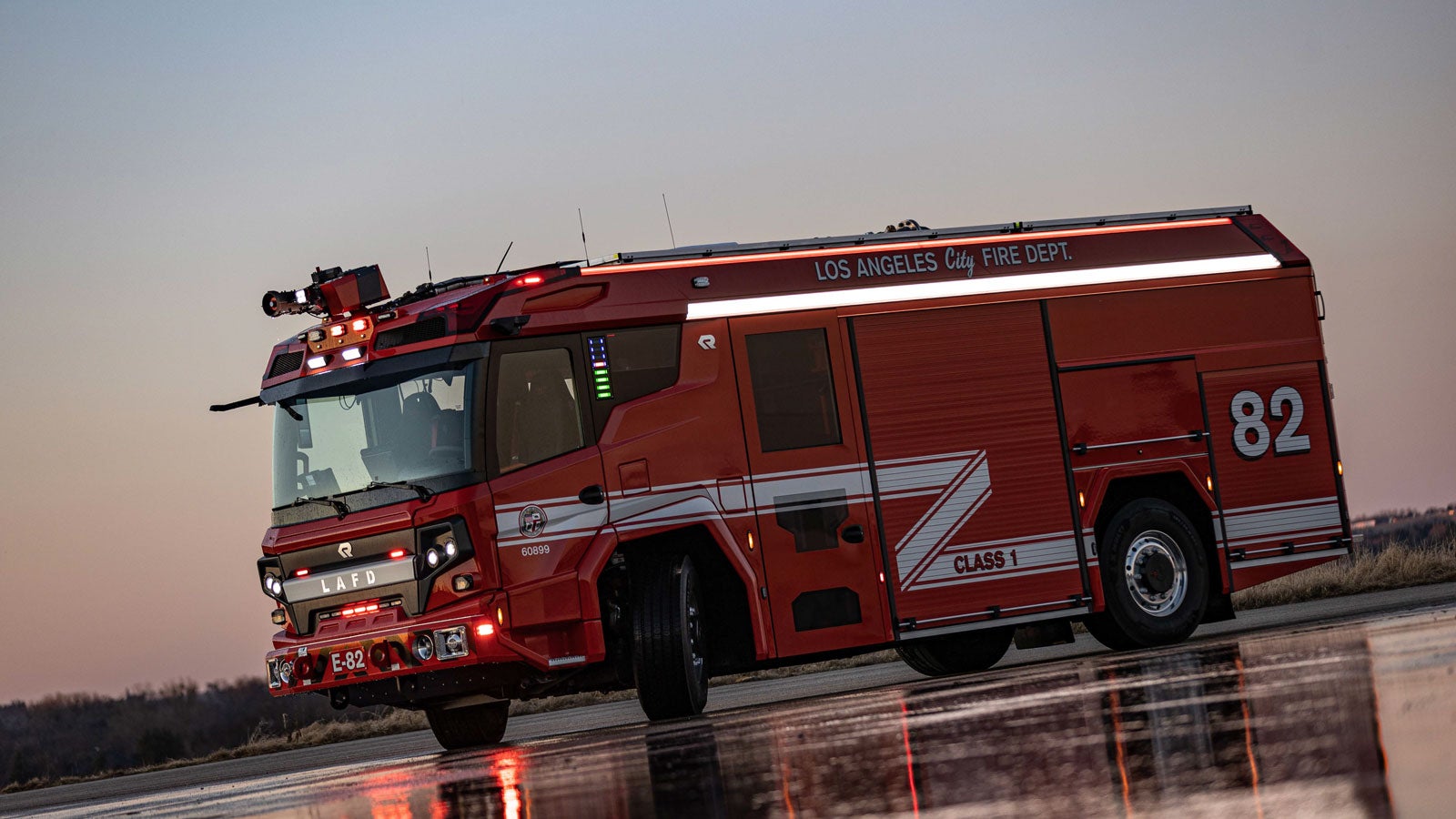 Los Angeles City Fire Department engine pumping water at a night