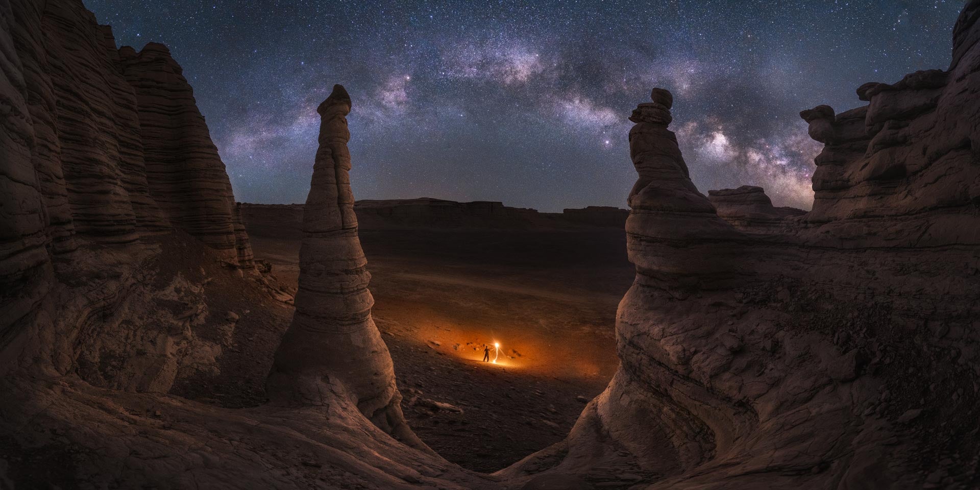 The galaxy above an eroded outcrop of the Dahaidao Desert, China. (Photo: Jinyi He)