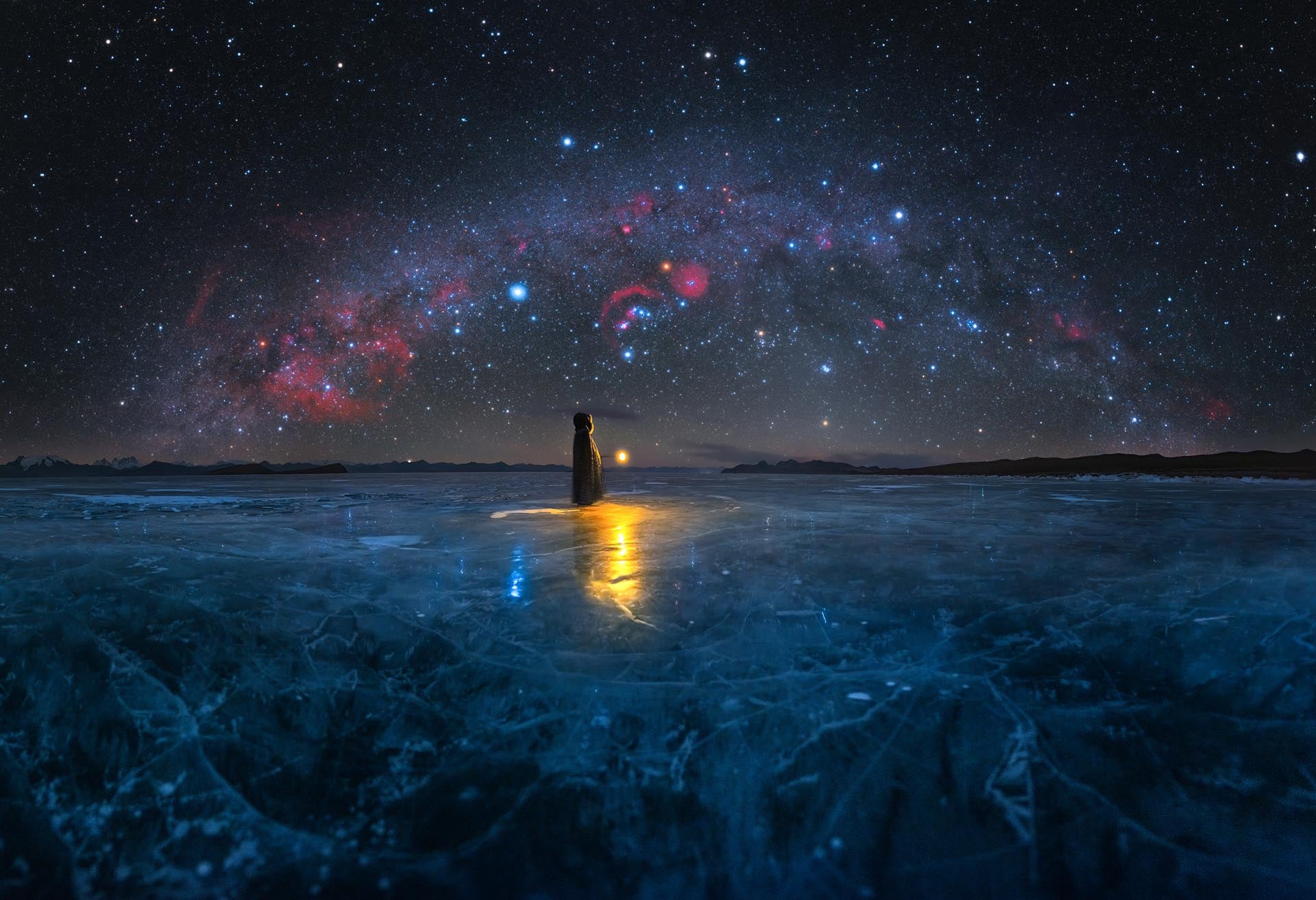 The Milky Way arch above a frozen lake in Tibet. (Photo: Alvin Wu)