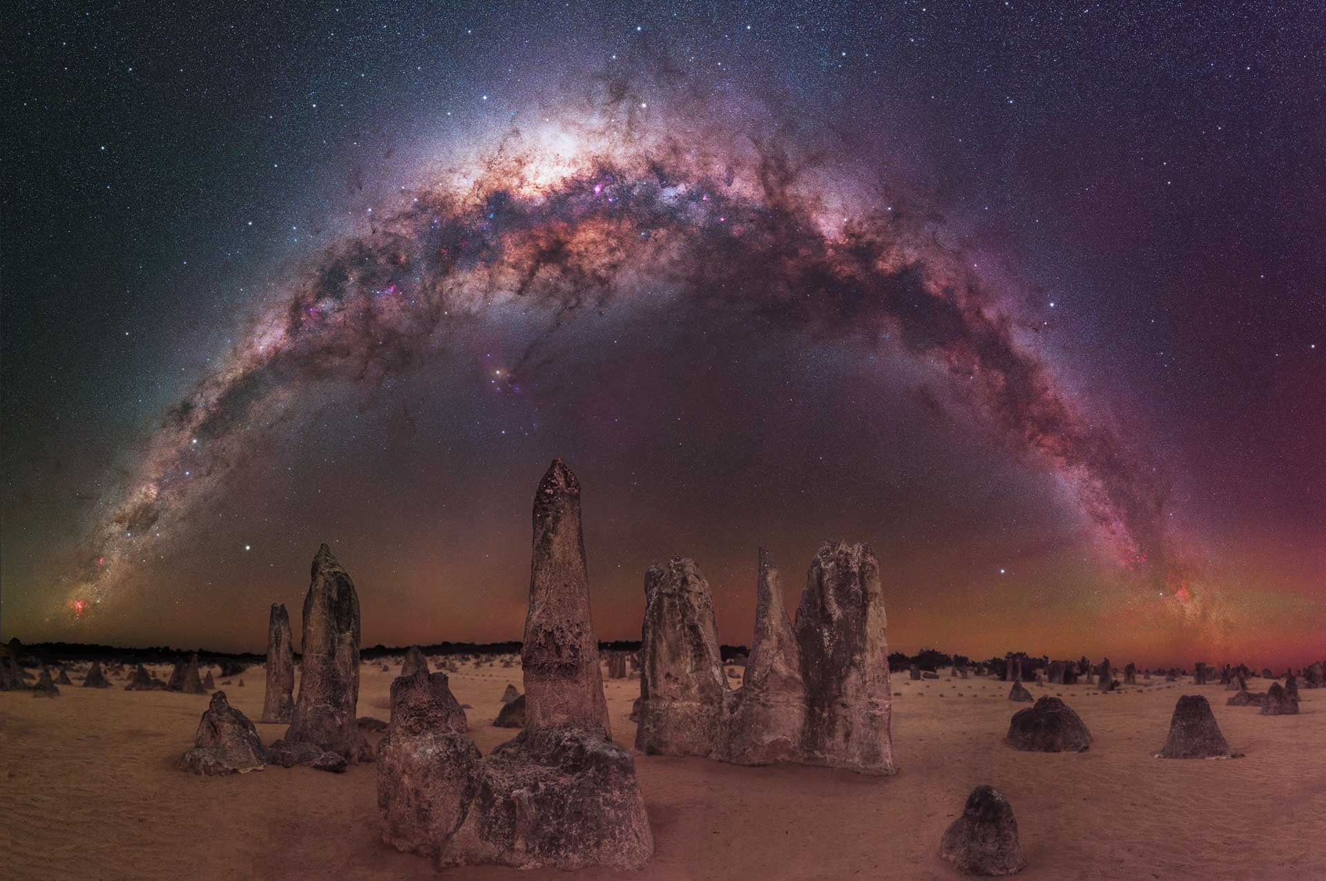 The Milky Way arching over rocks in the Australian desert. (Photo: Trevor Dobson)