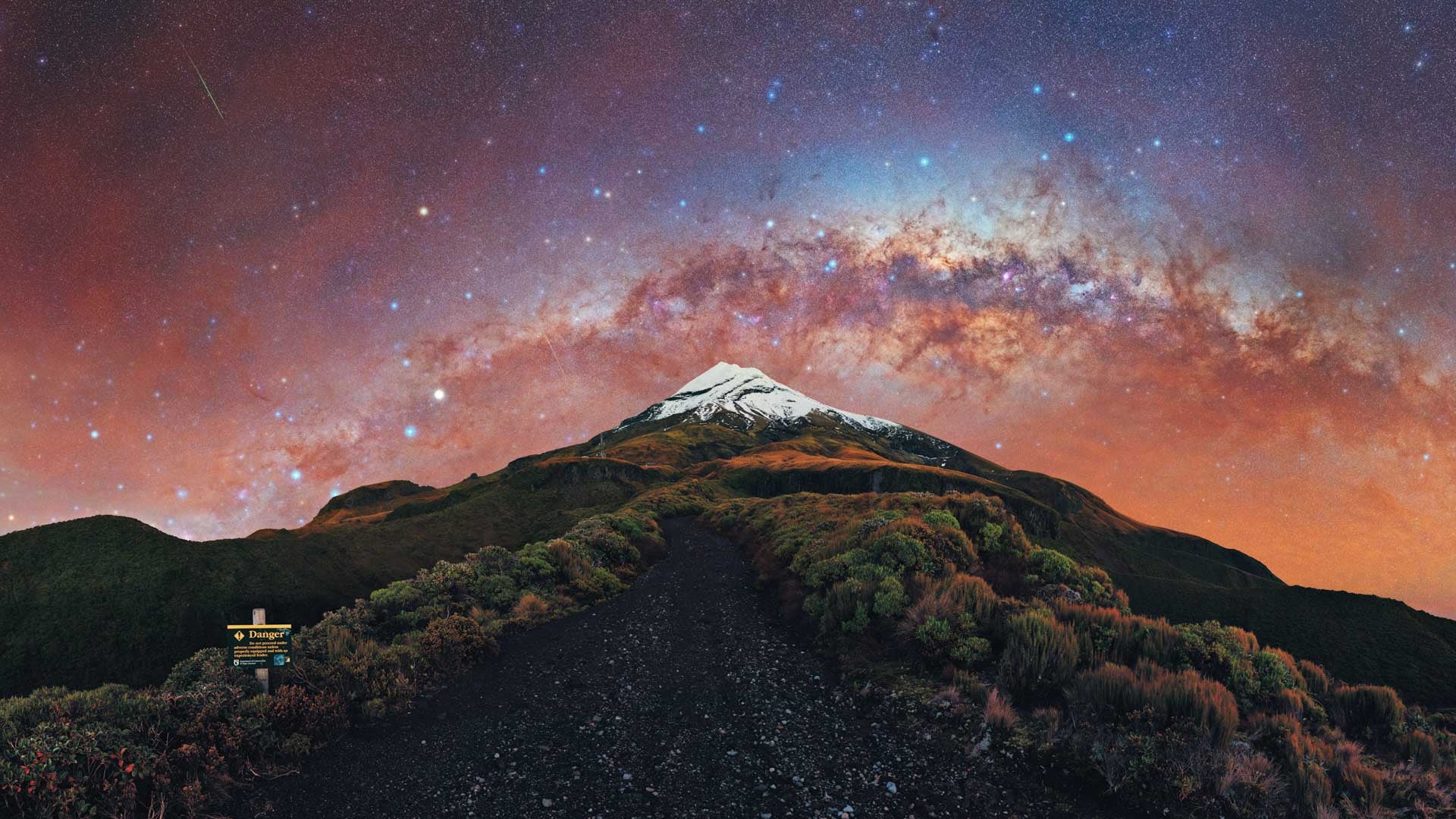 A starburst of colour from the Milky Way behind New Zealand's Mount Taranaki. (Photo: Evan McKay)