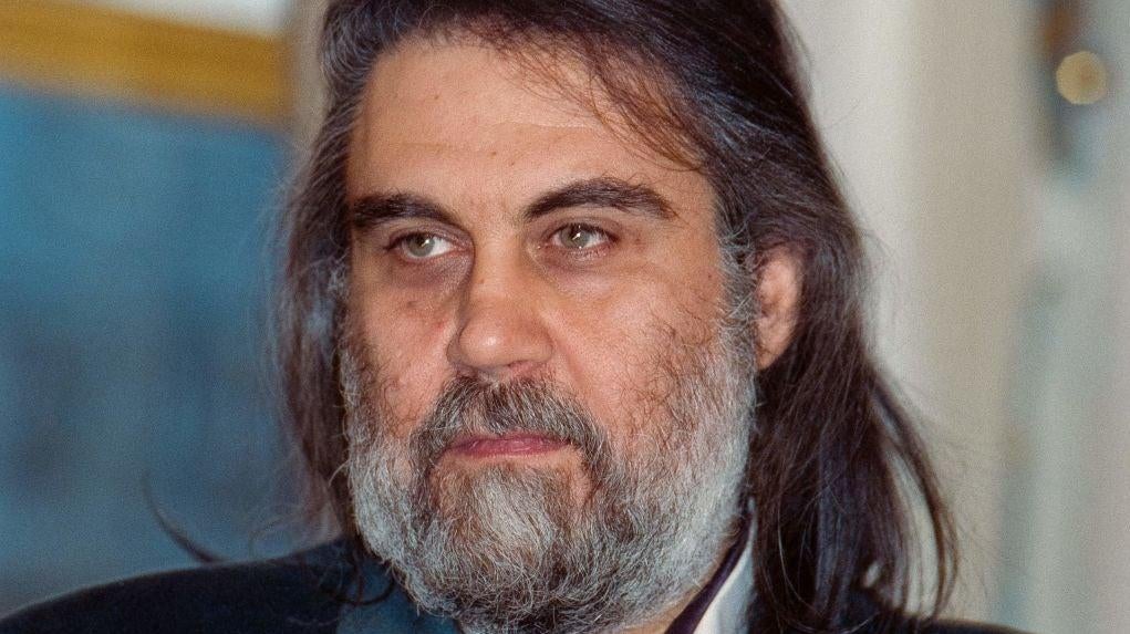 Musician and composer Vangelis, seen here in 1992 at the French Culture Ministry, has died. (Photo: Georges Bendrihem/AFP, Getty Images)