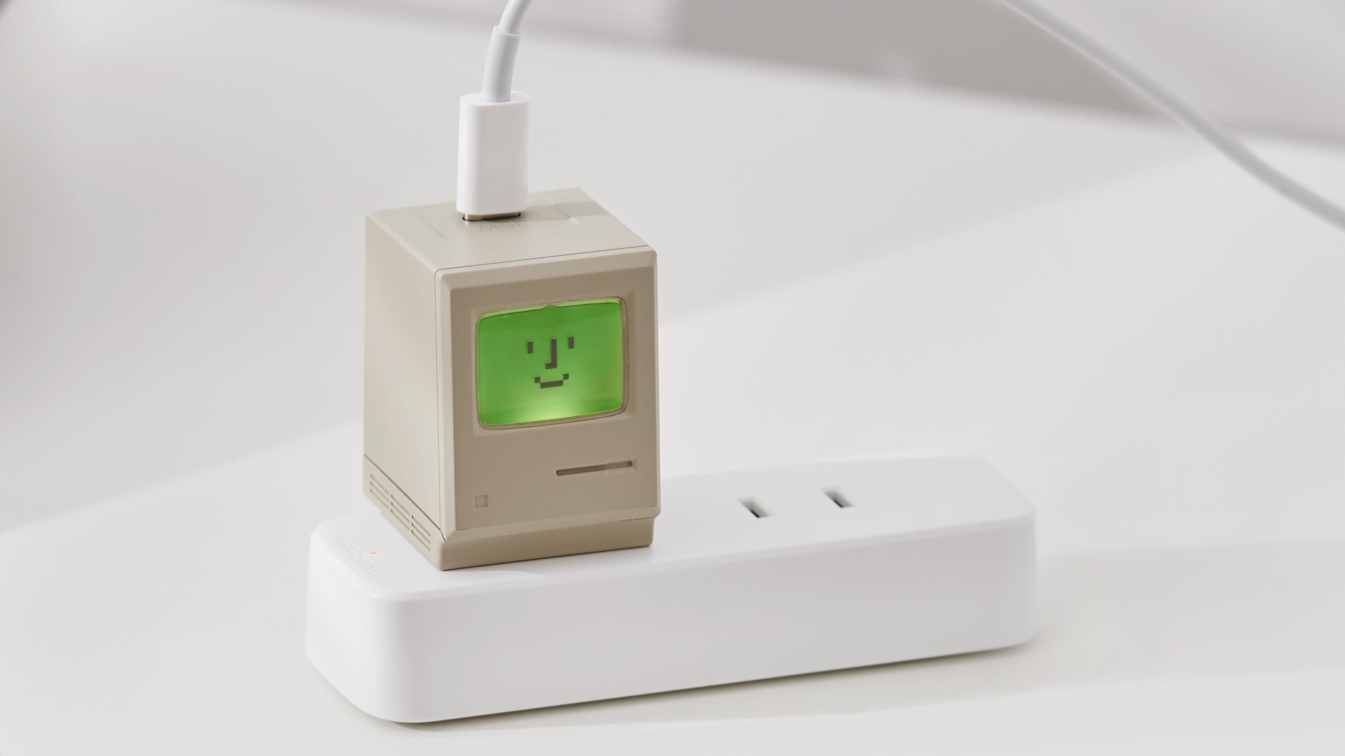 Apple Fans Will Be Powerless to Resist This Mini Macintosh USB-C Charger