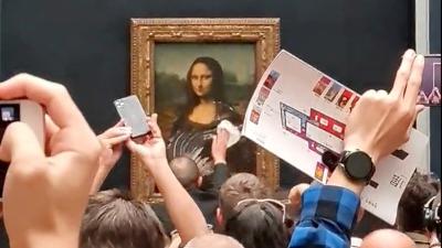 Tell Me Why the Mona Lisa Got Pummelled With Cake?