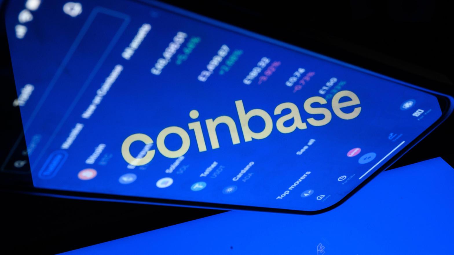 The crypto spiral is turning Coinbase into that employer who rescinds job offers via email. (Illustration: Leon Neal, Getty Images)