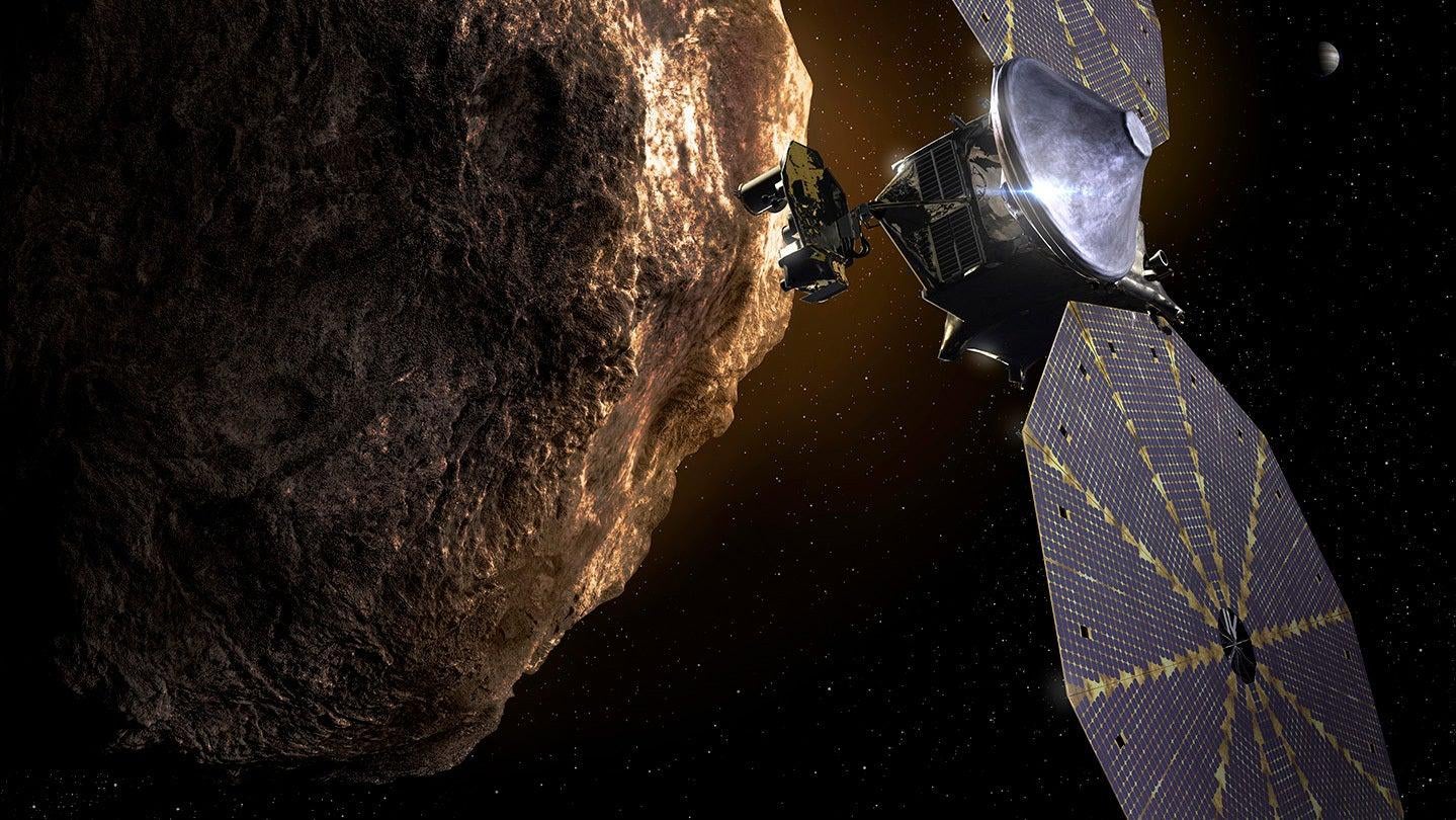 The Lucy spacecraft will be the first to visit the Trojan asteroids.  (Illustration: NASA)