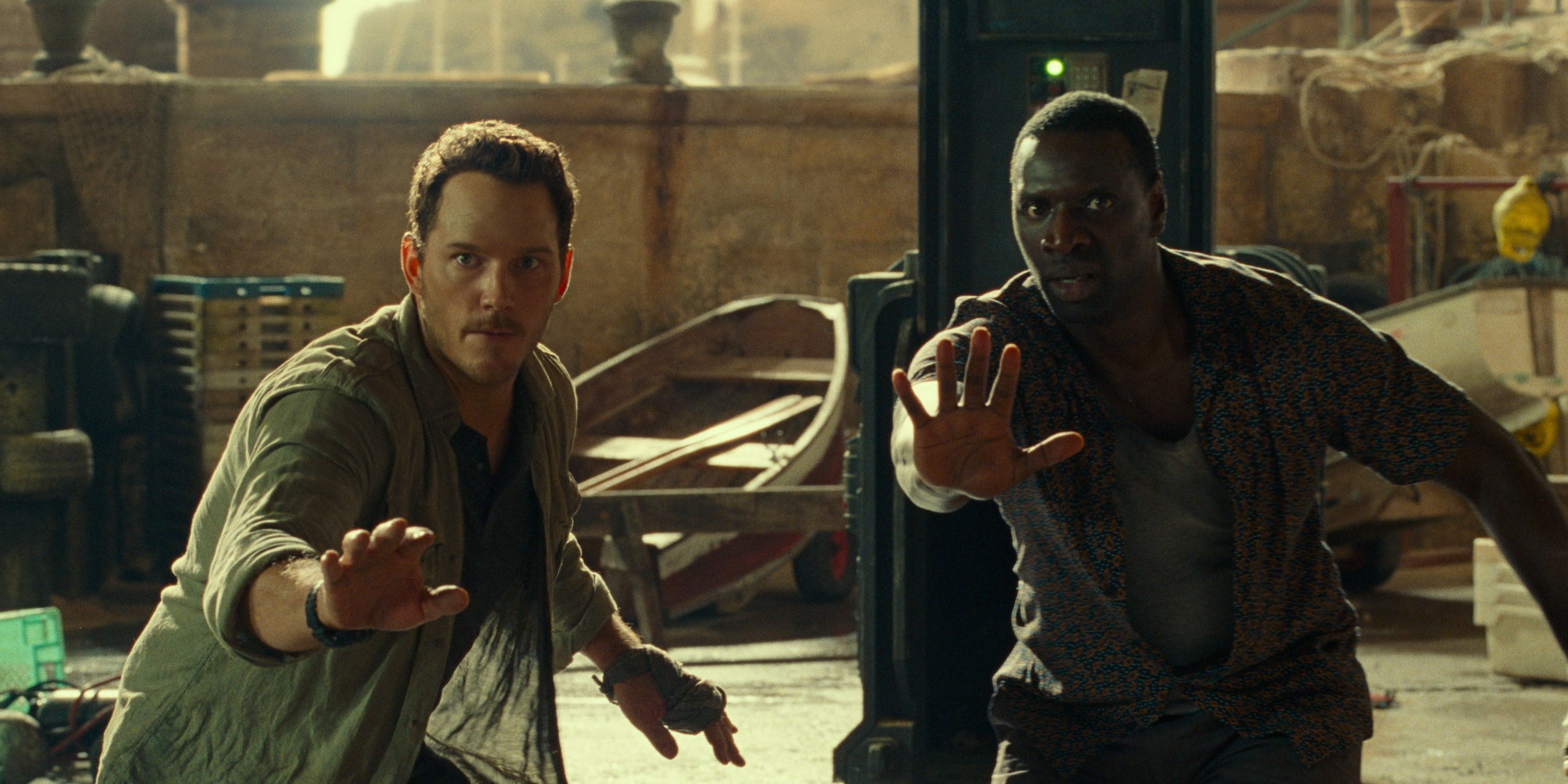 Owen and Barry Sembene (Omar Sy) do the hand thing. (Image: Universal)