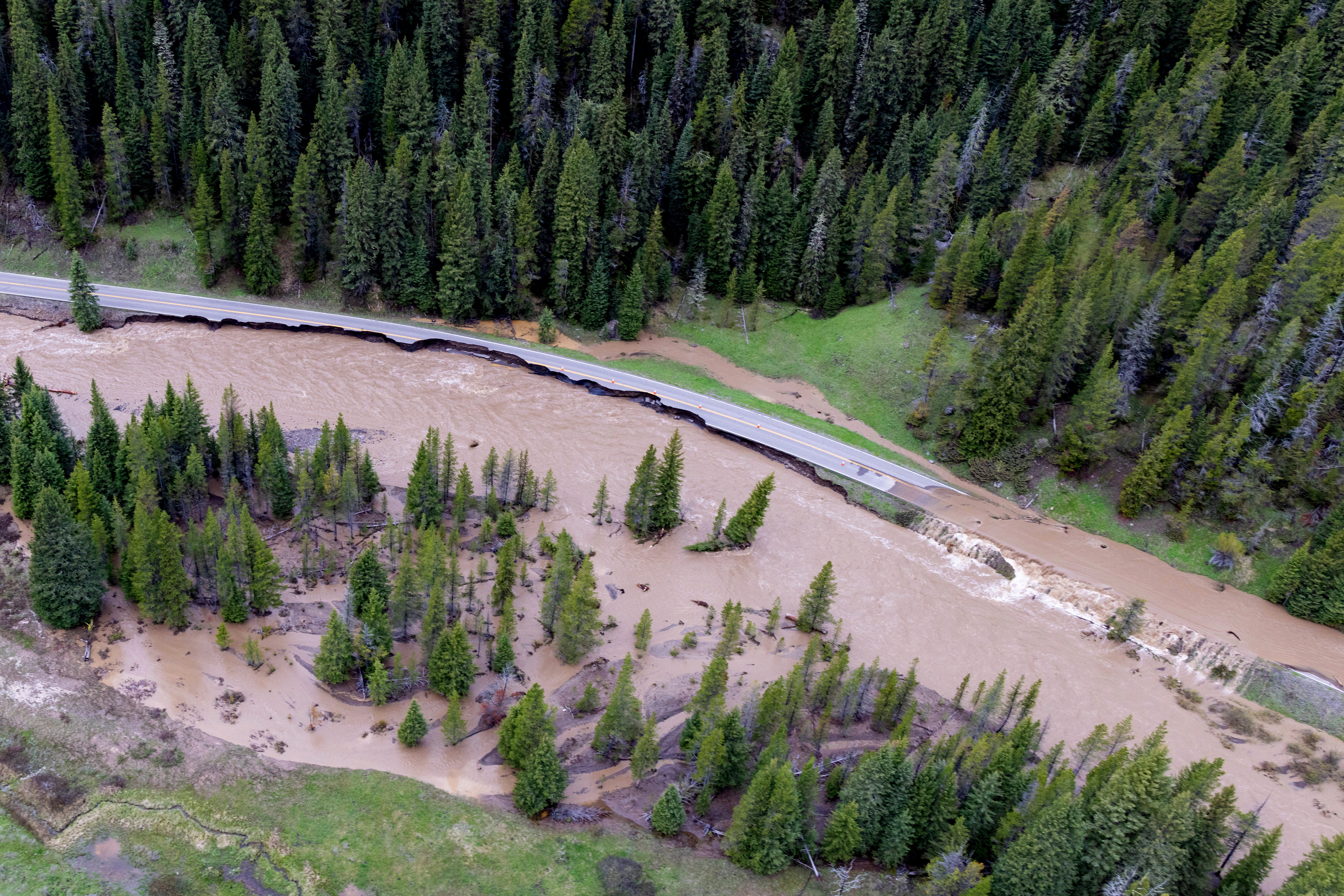 This aerial photo provided by the National Park Service shows a flooded  out North Entrance Road, of Yellowstone National Park in Gardiner,  Mont., on June 13, 2022. (Photo: Jacob W. Frank/National Park Service, AP)