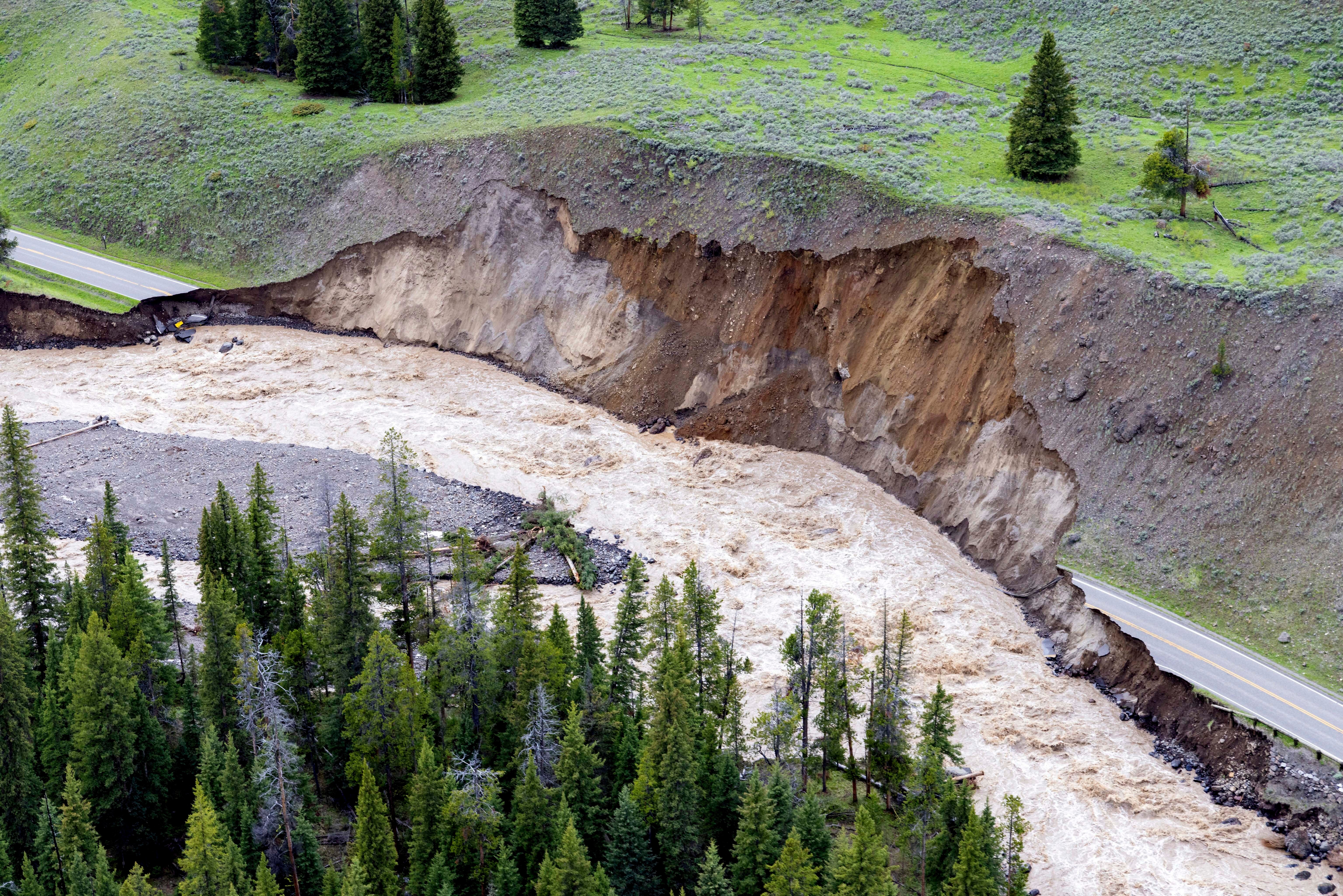 This aerial photo provided by the National Park Service shows a flooded  out North Entrance Road, of Yellowstone National Park in Gardiner,  Mont., on June 13, 2022. (Photo: Jacob W. Frank/National Park Service, Getty Images)