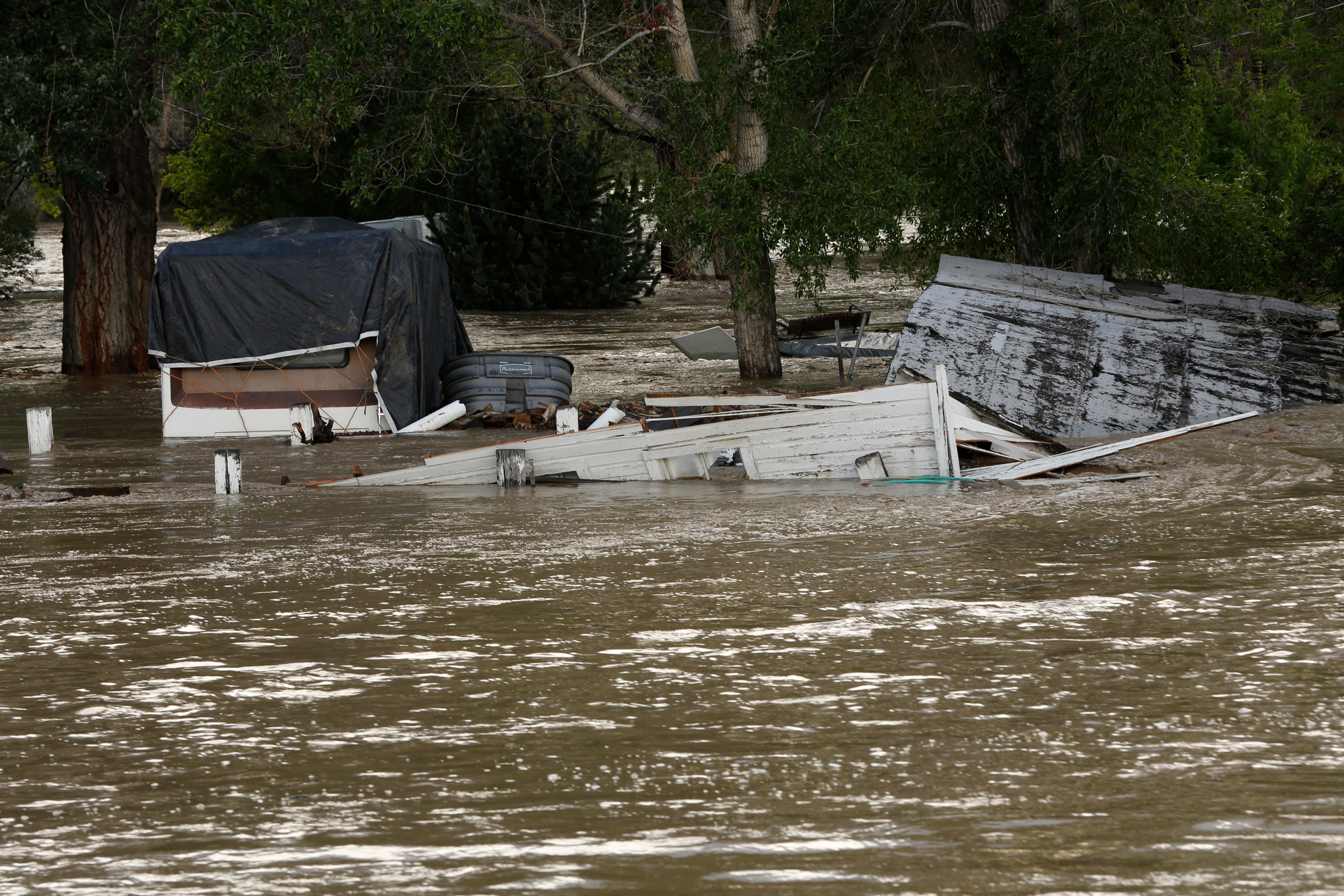 Floodwaters inundated property along the Clarks Fork Yellowstone River near Bridger, Mont, on Monday, June 13, 2022 (Photo: Emma H. Tobin, AP)