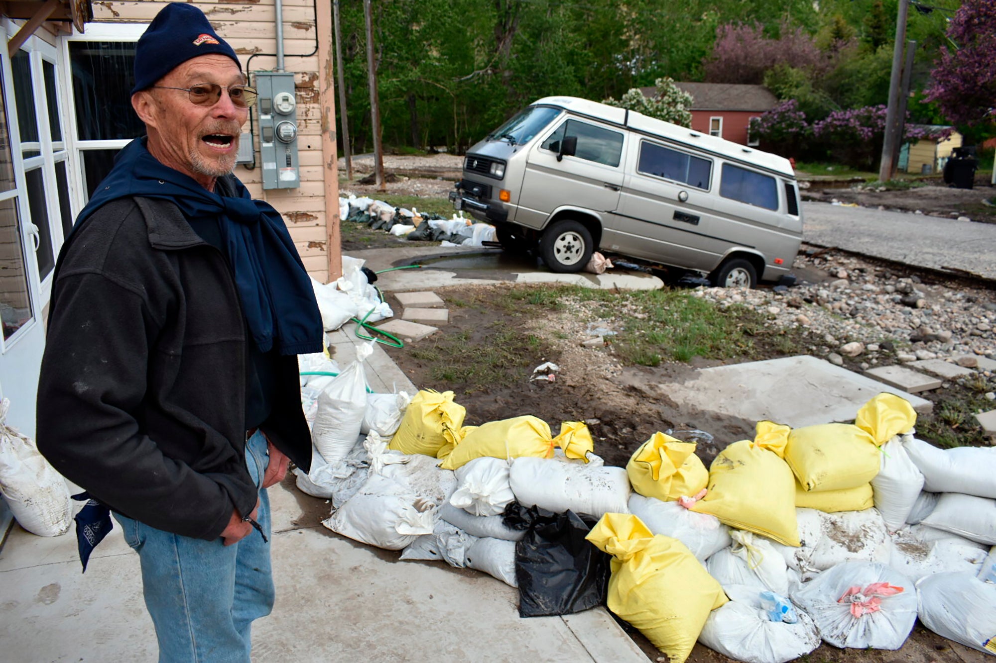 Ken Ebel is seen in front of his flood-damaged house and yard, Tuesday, June 14, 2022, in Red Lodge, Mont. (Photo: Matthew Brown, AP)