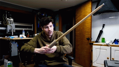 This Custom Self-Extending Cardboard Lightsaber Doesn’t Require Any Imagination