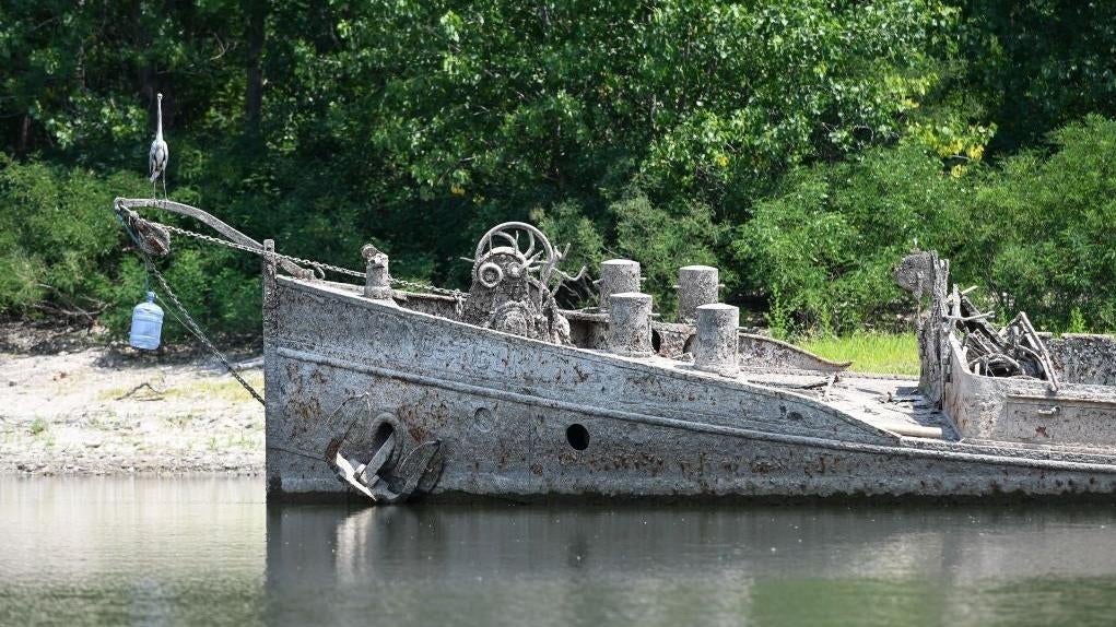A 55-metre barge that was sunk by American bombing in 1944 has re-emerged  from the River Po in Gualtieri, Italy, due to severe drought. (Photo: Piero CRUCIATTI / AFP, Getty Images)