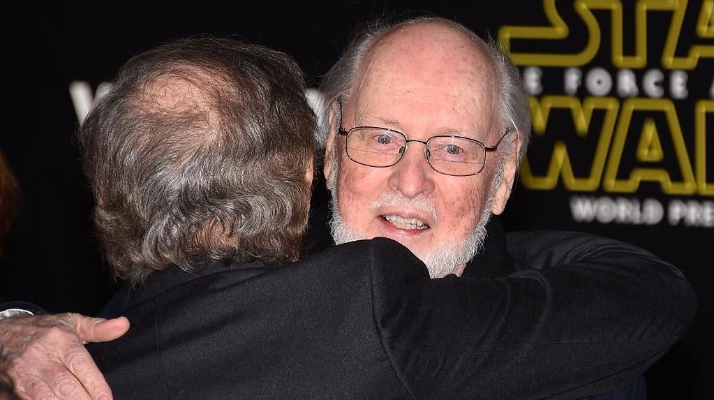 John Williams hugging Steven Spielberg at the premiere of Star Wars: The Force Awakens in 2015. (Photo: Ethan Miller, Getty Images)