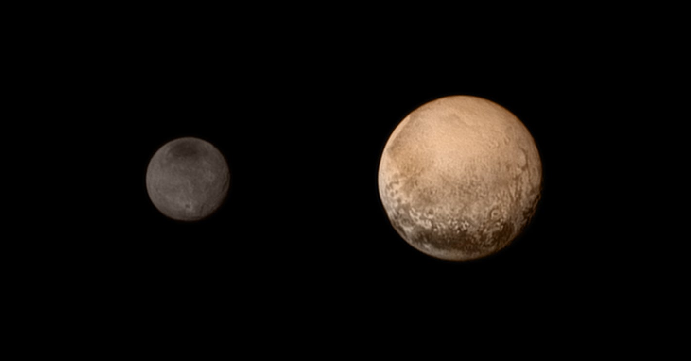 Pluto (right) and Charon (left) in an image taken by the New Horizons spacecraft. (Image: NASA/JHUAPL/SWRI, Getty Images)