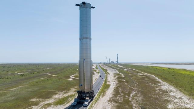 SpaceX Mounts Starship Booster on Launch Tower Ahead of Orbital Test Flight