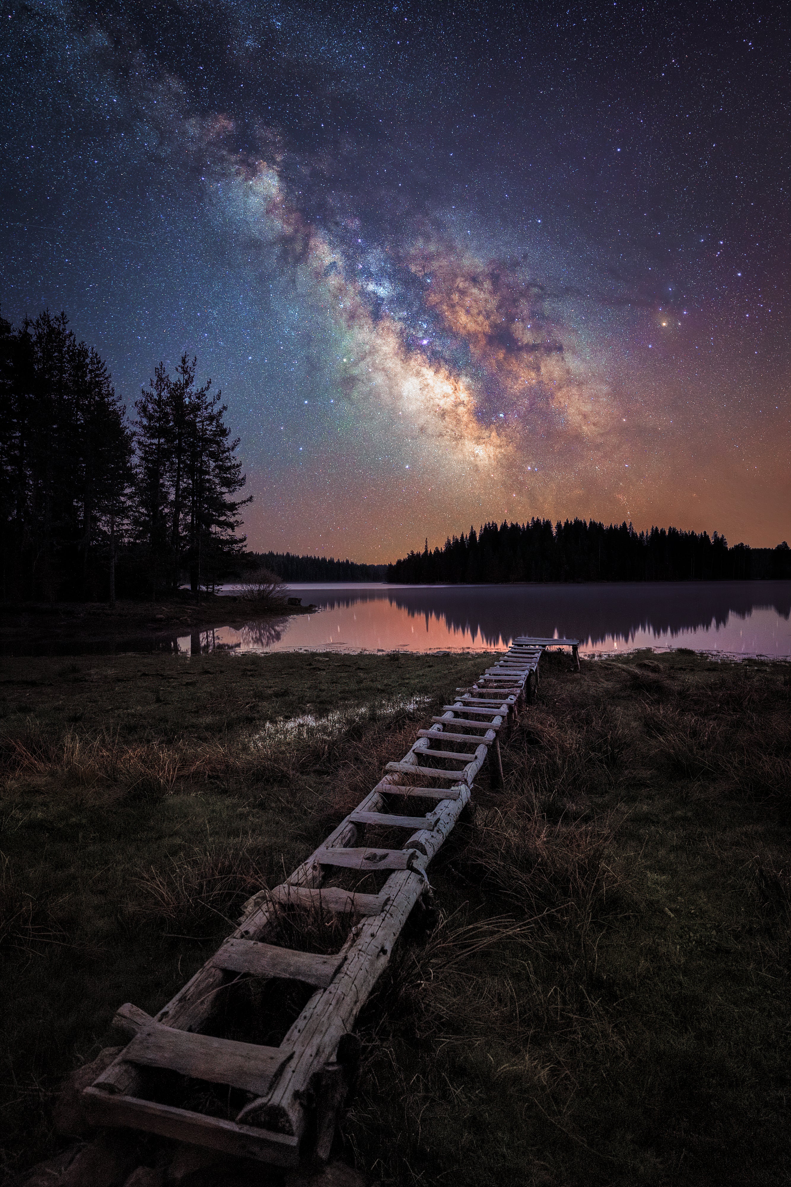 A wooden step structure in Bulgaria, the Milky Way looming above. (Photo: © Mihail Minkov)