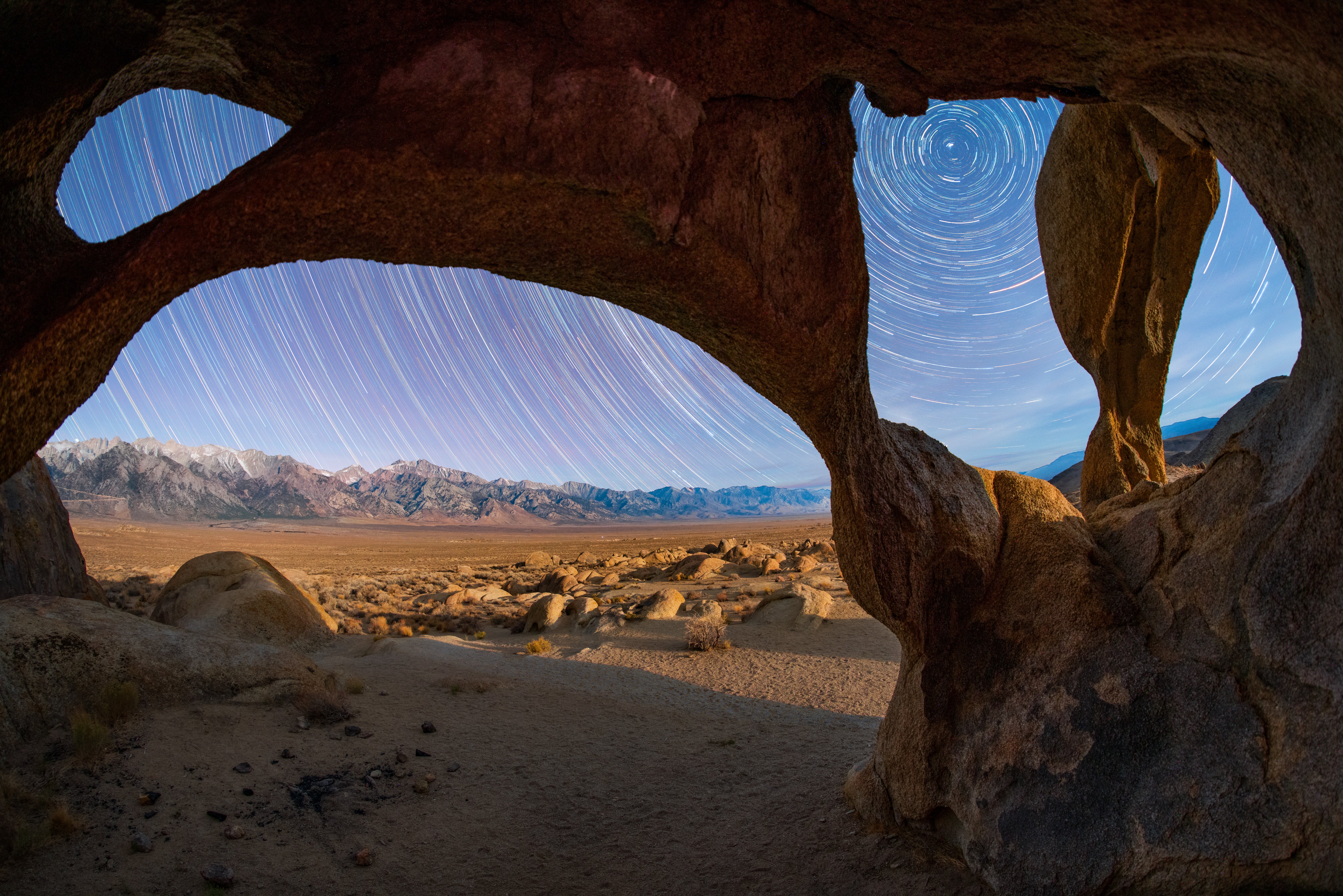 A swirl of stars outside a stone structure in the California desert. (Image: © Sean Goebel)