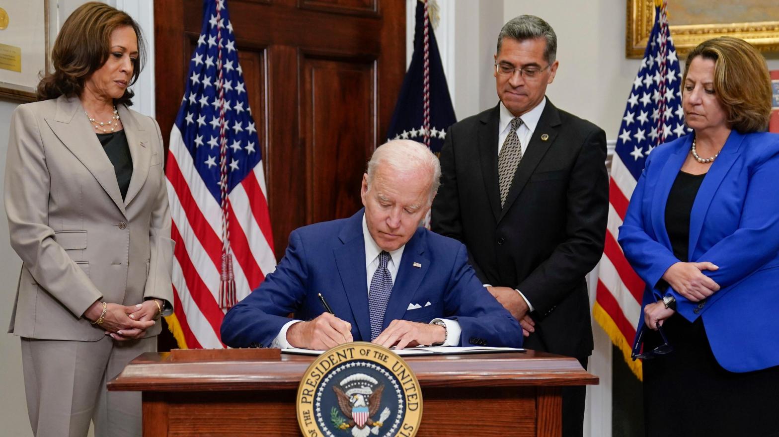 President Joe Biden signs an executive order on abortion access on July 8th. (Photo: Evan Vucci, AP)