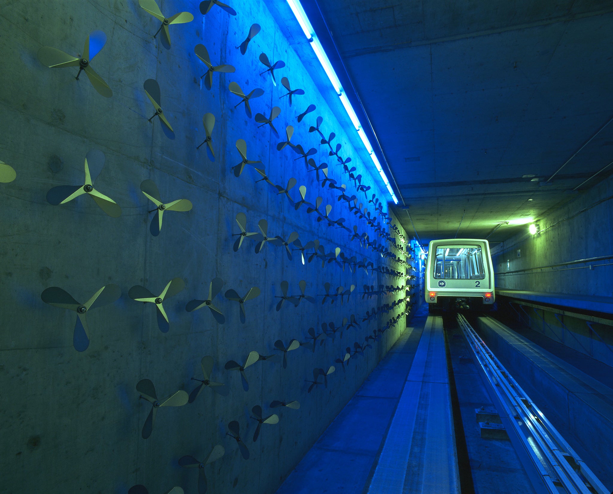 The tunnels also feature trams, which may or may not shuttle lizard people to their bunkers. (Image: Denver International Airport)