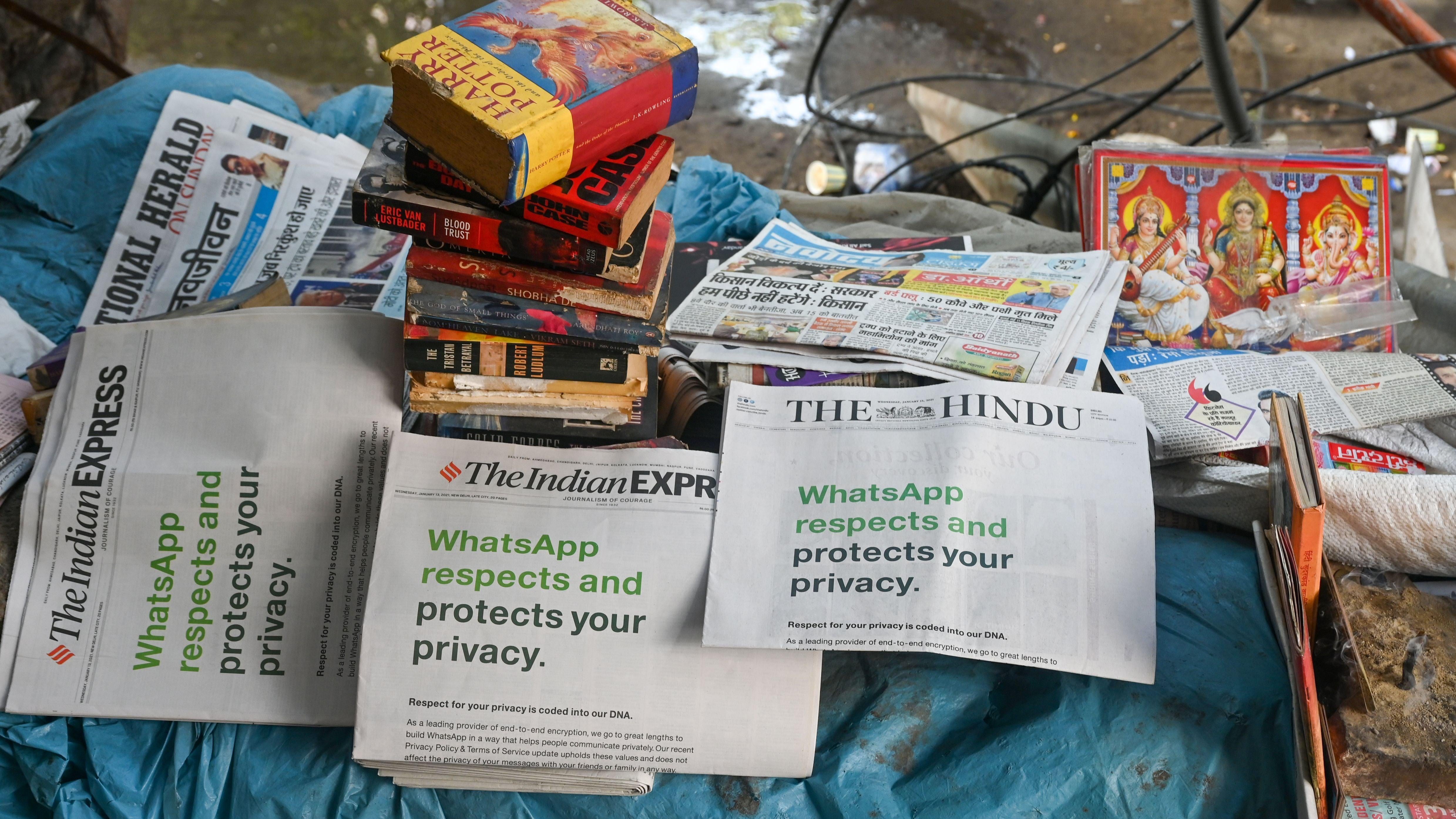 An advertisement from WhatsApp is seen in a newspaper at a stall in New Delhi on January 13, 2021 (Photo: Sajjad Hussain, Getty Images)