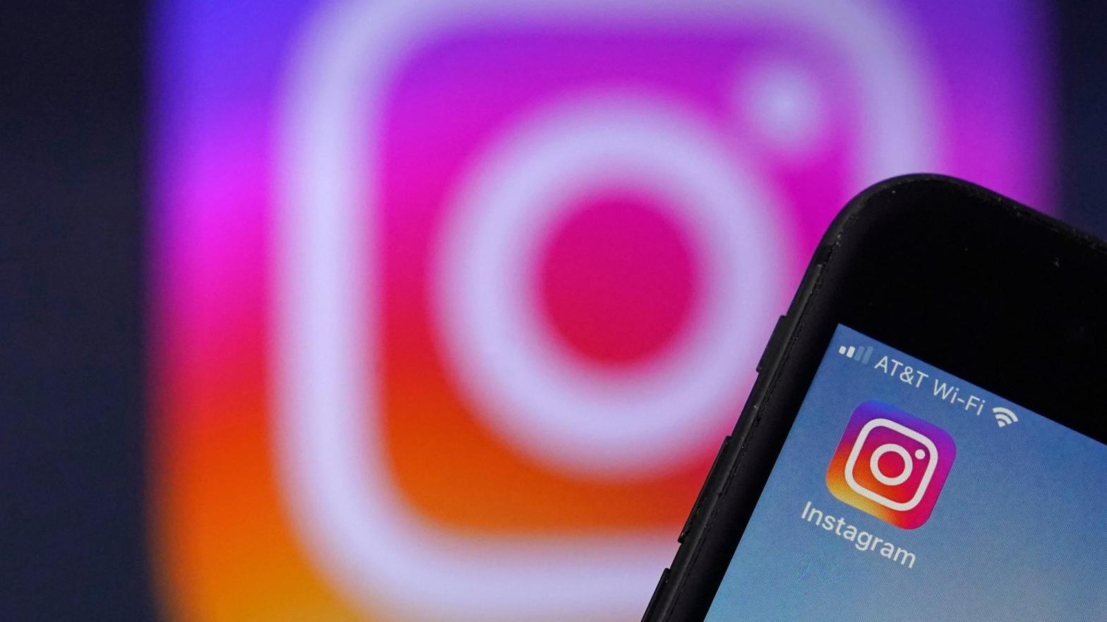 In response to user fury, Instagram will pause its full-screen test and reduce the number of recommendations it shows users. (Photo: Charles Krupa, AP)