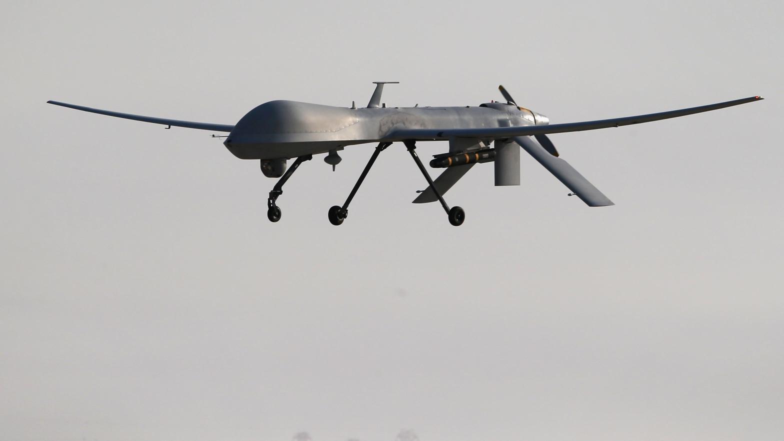 File photo of a U.S. Air Force MQ-1B Predator unmanned aerial vehicle (UAV), carrying a  Hellfire missile landing at a secret air base after flying a mission in  the Persian Gulf region on January 7, 2016. (Photo: John Moore, Getty Images)
