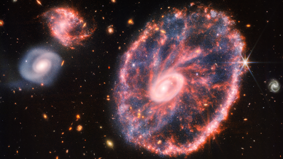 The Cartwheel Galaxy features a small inner ring and a larger outer ring that has been expanding for over 440 million years.  (Image: NASA, ESA, CSA, STScI)