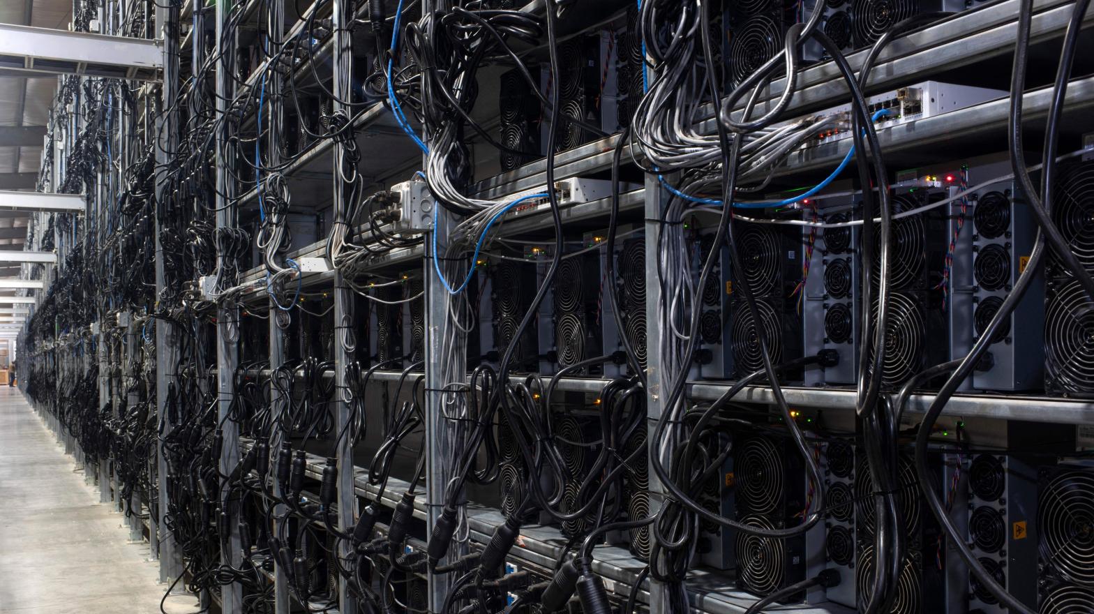 The bitcoin mining machines in the Whinstone Bitcoin mining facility in Rockdale, Texas, owned and operated by Riot Blockchain. (Photo: MARK FELIX/AFP /AFP, Getty Images)