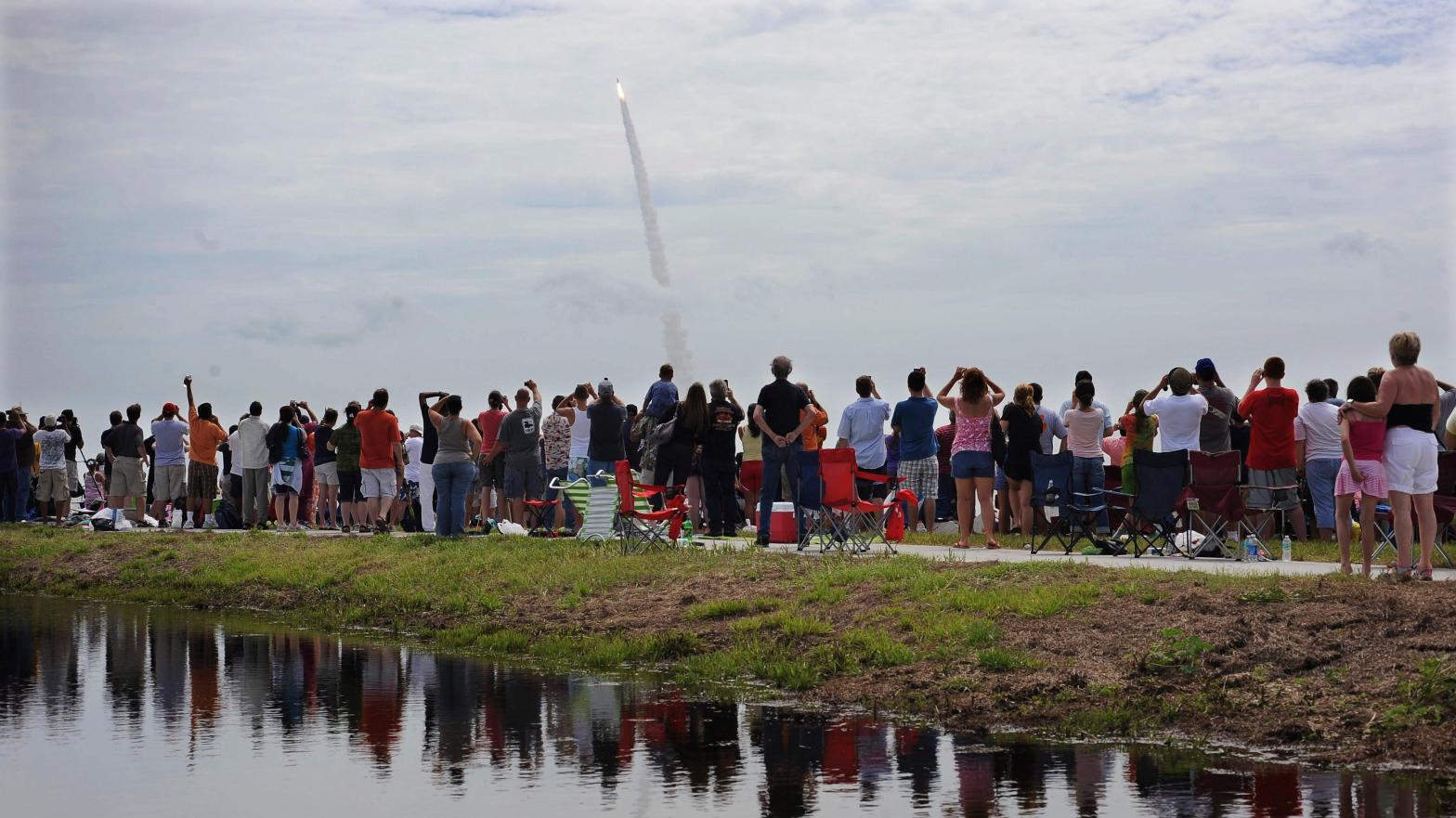 Spectators watch the Space Shuttle Atlantis blasting off on July 8, 2011. The launch was the 135th and final Space Shuttle launch for NASA.  (Photo: Phil Sandlin, AP)