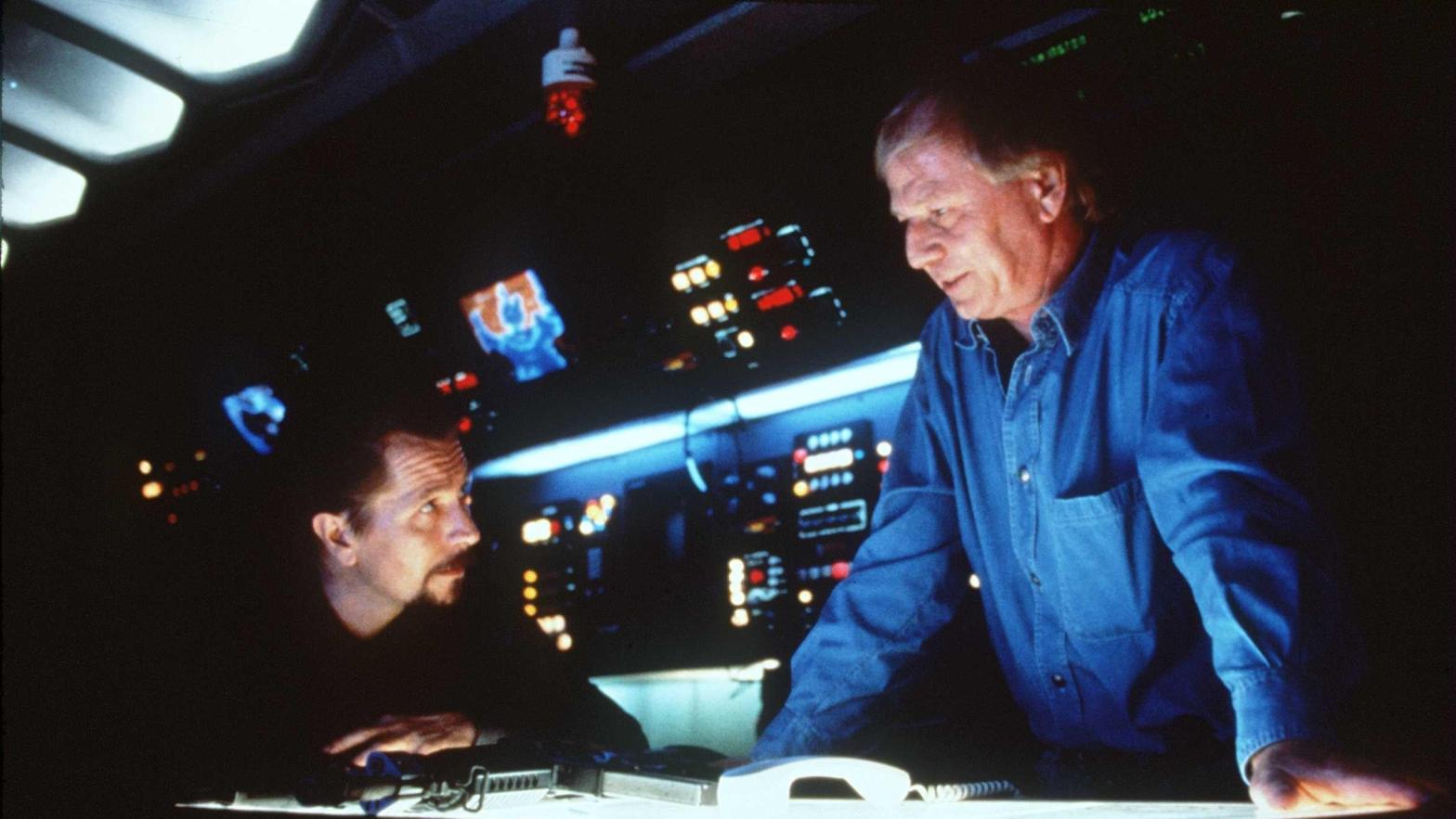 Wolfgang Petersen on the set of Air Force One, with Gary Oldman. (Photo: Sony Pictures, Getty Images)