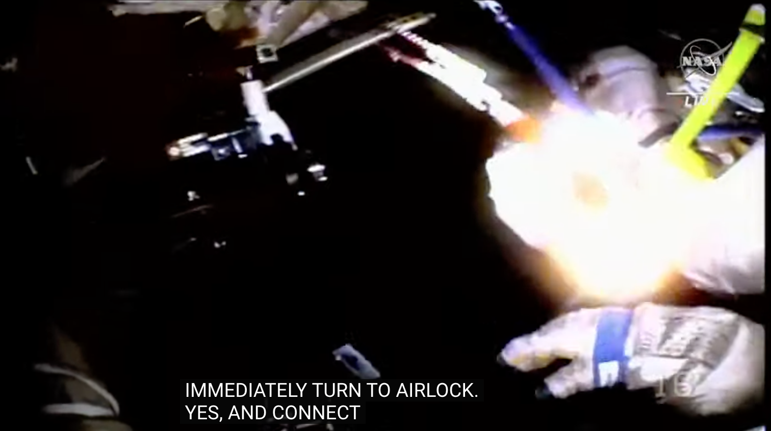 Cosmonaut Oleg Artemyev was ordered to return to the airlock immediately and connect to station power. (Screenshot: NASA TV)