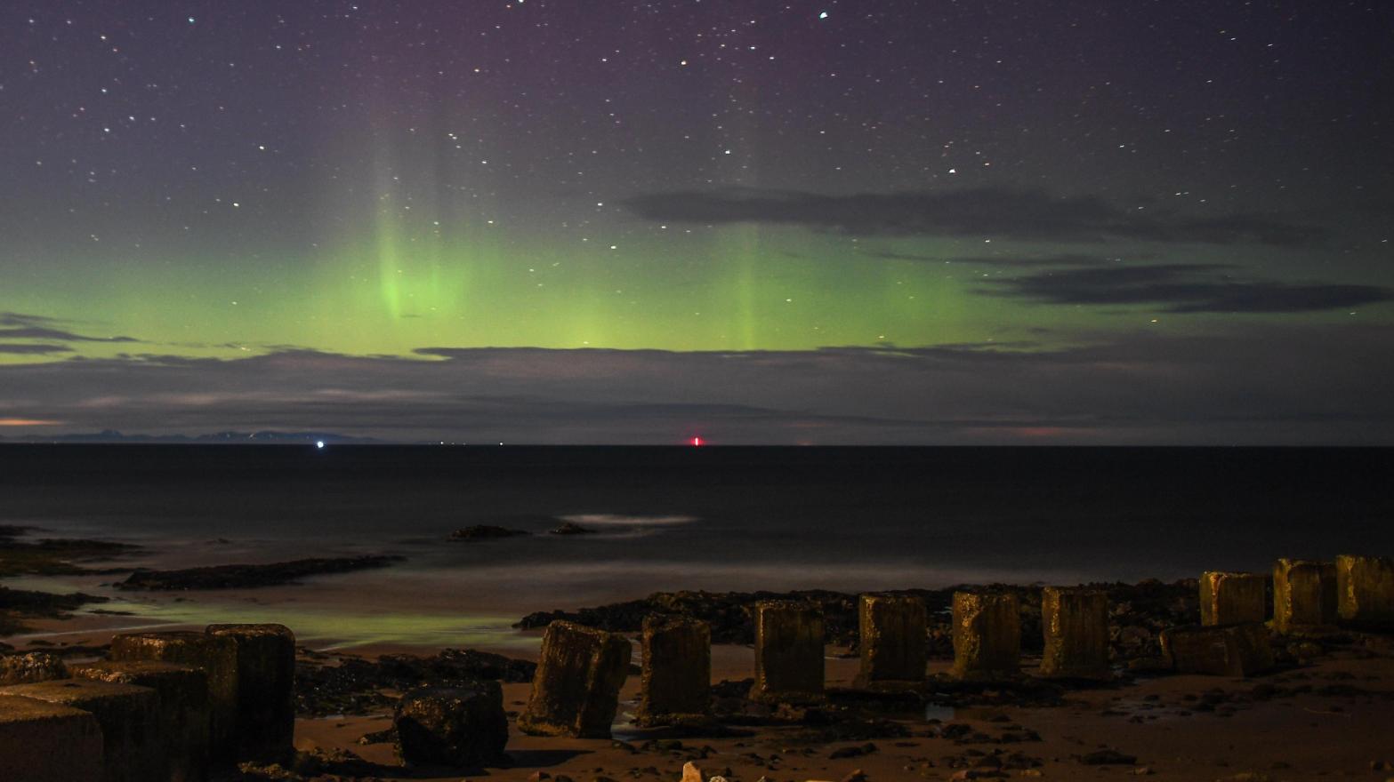 Northern Lights seen from the coast of Scotland in February, 2021. (Photo: Peter Summers, Getty Images)